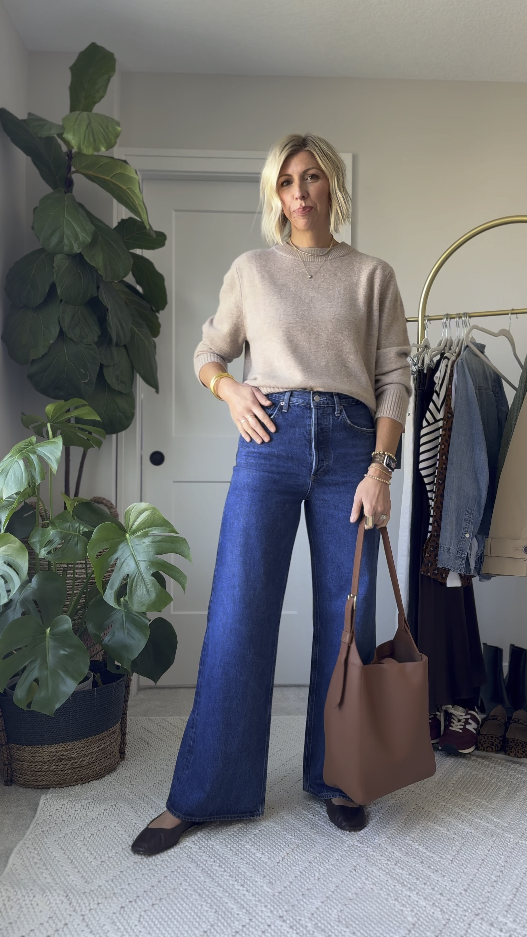 Fall staples set the foundation of a great outfit… classic cashmere sweater, dark wash, wide light jeans, ballet flats, leather tote

#LTKStyleTip #LTKOver40 #LTKVideo