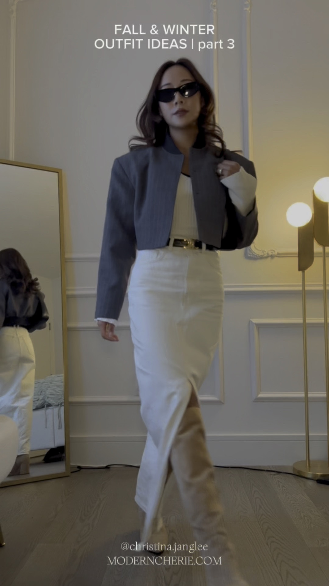 Fall winter outfit ideas - part 3 | casual chic style Inspo. Cream sweetheart neckline long sleeve knit top. Cream denim maxi skirt with slit. Celine triomphe belt and sunglasses. Suede knee high boots. Grey cropped bomber jacket. YSL bag. #falloutfits #winteroutfits #casualchic