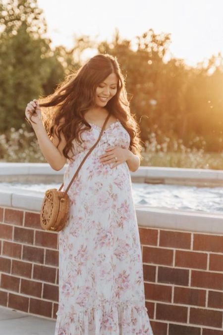 This floral maternity dress is perfect for spring maternity outfits!

#LTKbump #LTKunder100