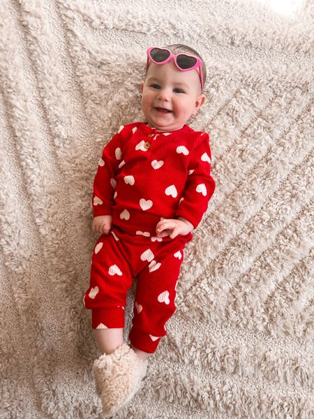 The cutest baby girl Valentine’s Day outfit ❤️ we love this little cozy ribbed set from Target! 🫶 pairs perfectly with her fun heart shaped sunglasses and Sherpa baby ugh slippers too❤️

#LTKkids #LTKbaby #LTKstyletip