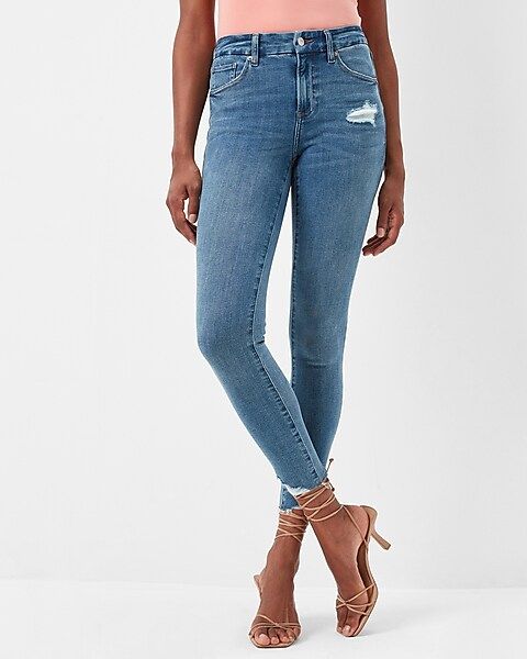 Mid Rise FlexX Medium Wash Ripped Hem Skinny Jeans | Express