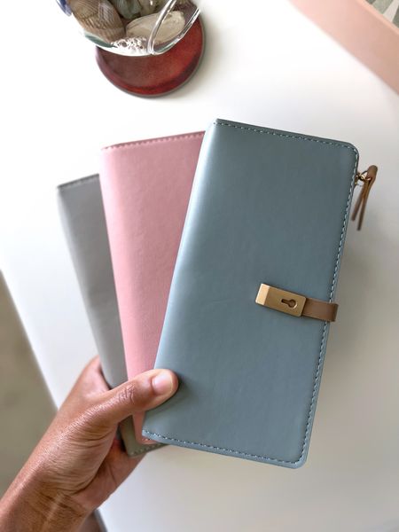 Carry this super cute, faux-leather wallet in your handbag or grab one to give as a gift for a friend. Choose from colors pink, blue and gray. 

This long wallet has plenty of slots to hold your money and cards. Its classic, slim design also makes it simple to use as a clutch. 

#LTKunder50 #LTKstyletip #LTKunder100