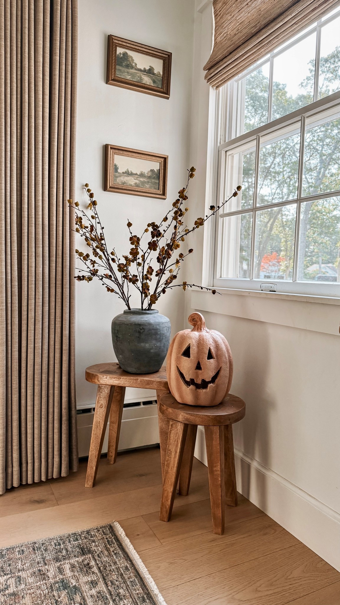 Earthy fall decor 🍂

corner decor styling | LED pumpkin decor 
fall branches | autumn | brown drapes 
landscape wall art | wood stool | vase 
organic modern | affordable decor

#LTKHome #LTKSaleAlert #LTKStyleTip