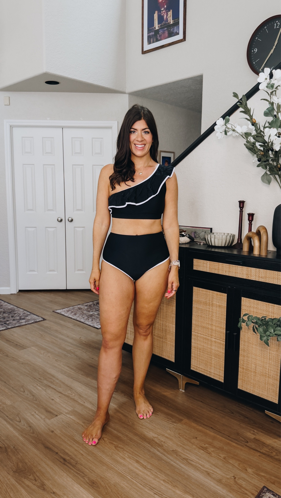 In a large one shoulder ruffle swimsuit 

#LTKSaleAlert #LTKMidsize #LTKSwim