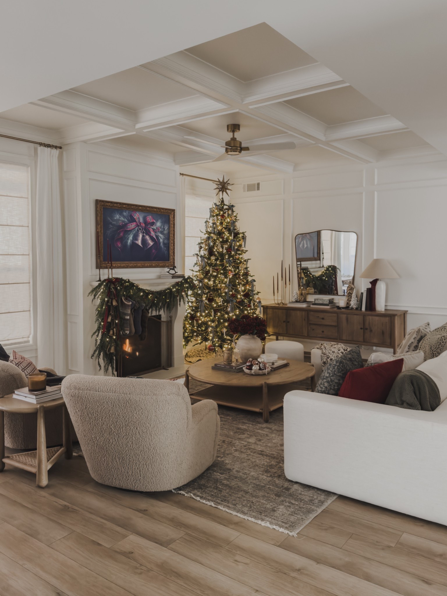 Cozy, collected holiday views in the living room! Absolutely loving the blend of color, tones, and texture this season including pops of burgundy and soft blue.

Home finds, collected holiday inspo, holiday living room, timeless holiday style, furniture favorites, neutral wood tones, moody area rug, sofa details, accent chair, side table, brass detail, King of Christmas, Four Hands, Castlery, Frame Tv, Visual Comfort, Loloi, found it on Amazon, collected style, shop the look!

#LTKSeasonal #LTKHome #LTKHoliday
