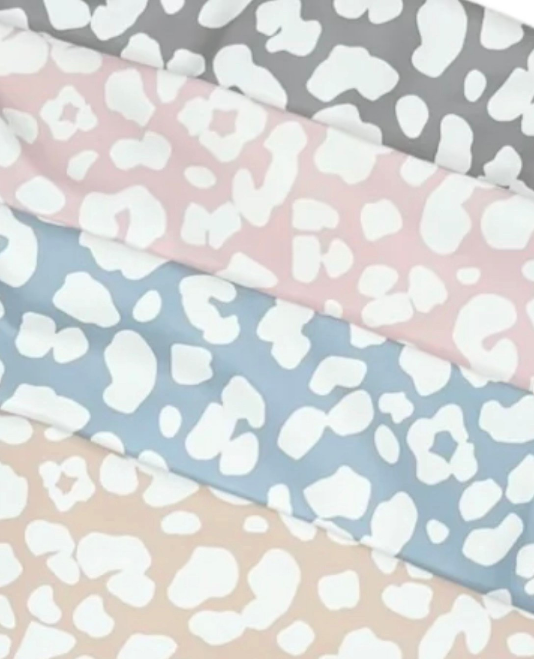 Neutral and pastel leopard baby bubs. Long sleeve with pocket and double snap closure. 

#LTKGiftGuide #LTKmomlife #LTKBaby