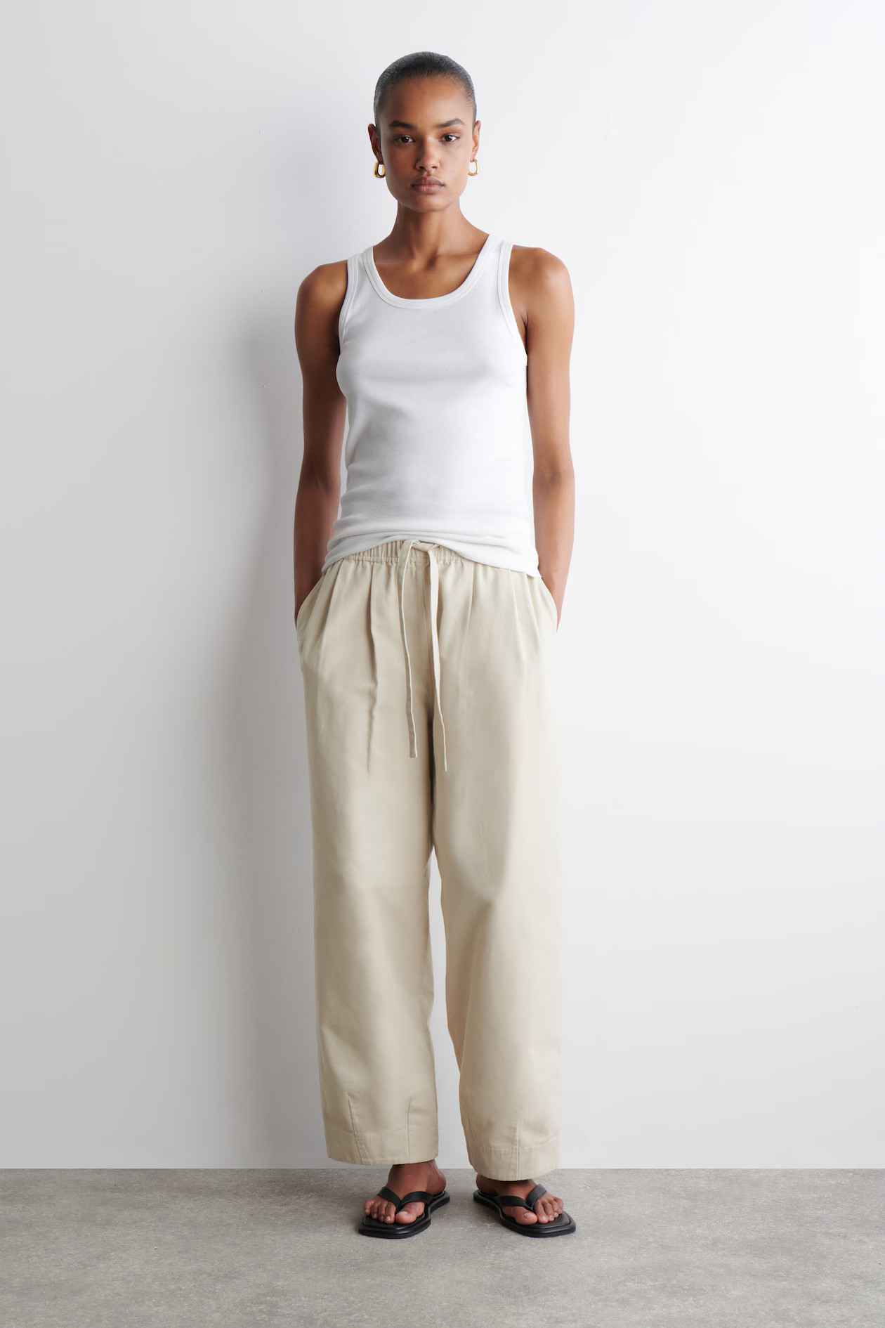 COTTON TAPERED DRAWSTRING TROUSERS - LIGHT BEIGE | COS | COS UK