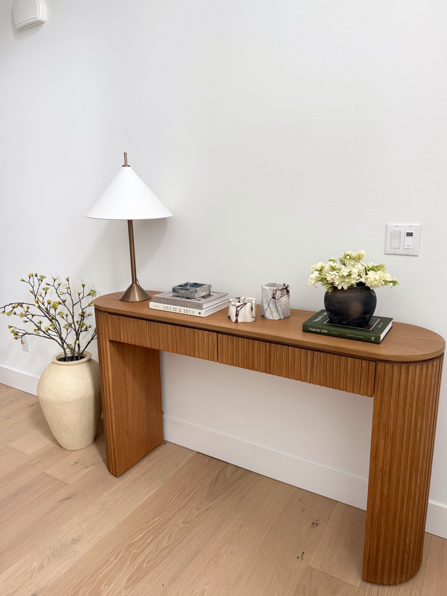 Entry way with light and dark contrast! Will be adding picture frames above in the near future!

#LTKHome