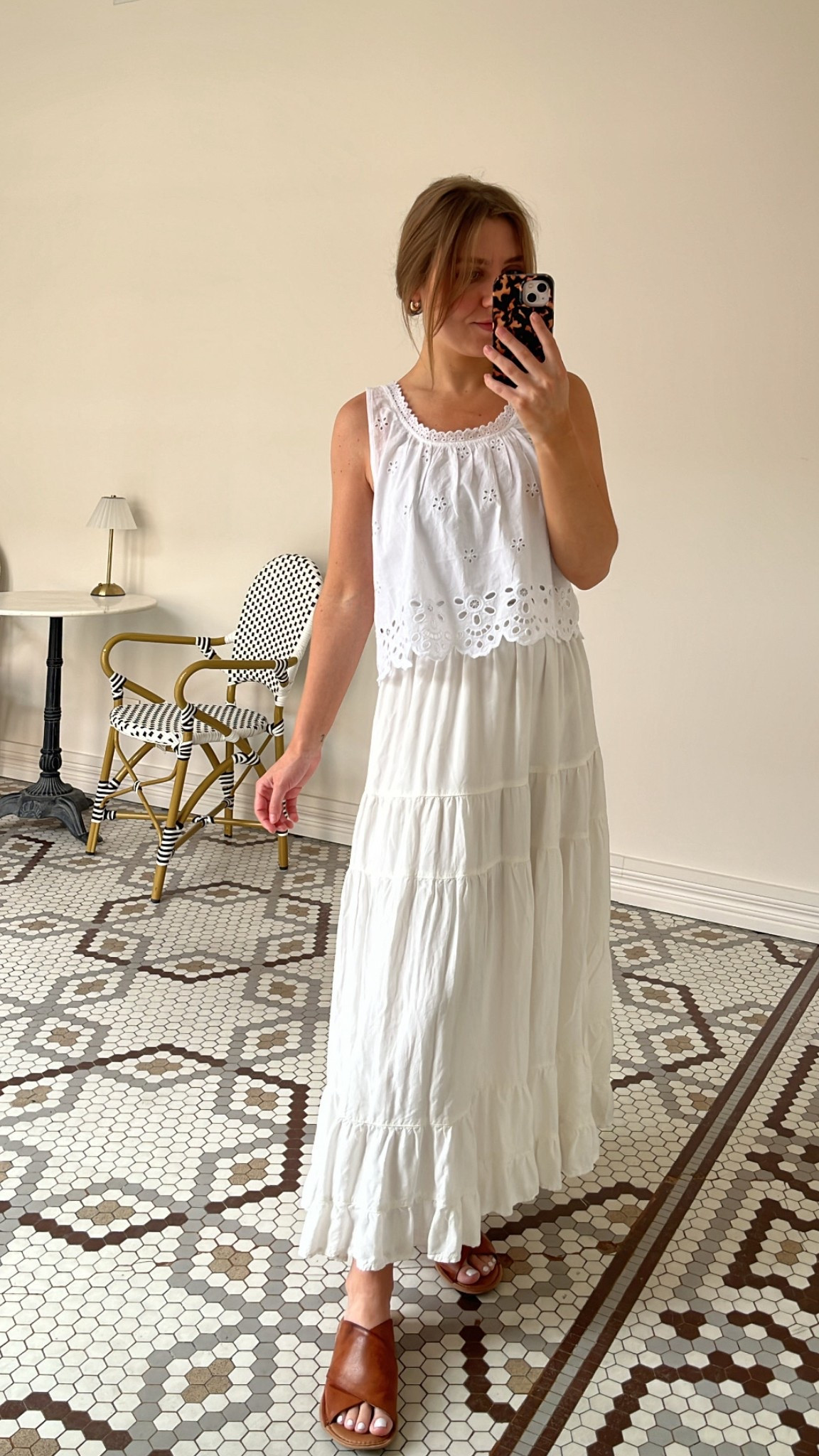 Detailed blouses are such a great style for spring and summer outfits. This easy, breezy white sleeveless blouse from Old Navy has great eyelet detailing, and is perfect to pair with a white skirt, jeans, or shorts this summer. - Cassie, MCO Content Coordinator

#LTKShoeCrush #LTKStyleTip #LTKSeasonal