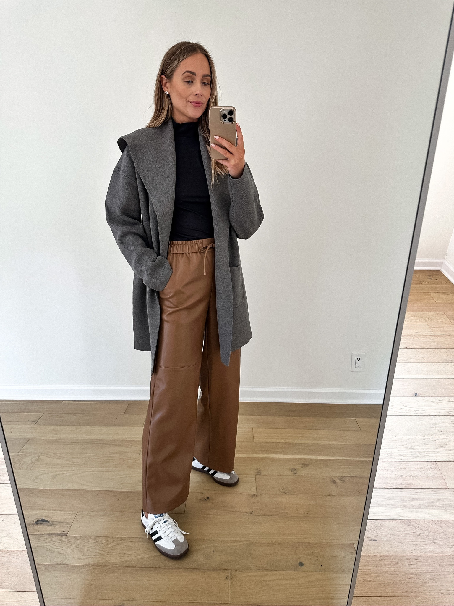 Fashion Jackson wearing grey coatigan (small) black turtleneck (small) vegan leather pants (small) adidas sneakers #fashionjackson #MAYSON #falloutfit #sneakers 

#LTKstyletip #LTKfindsunder100 #LTKshoecrush