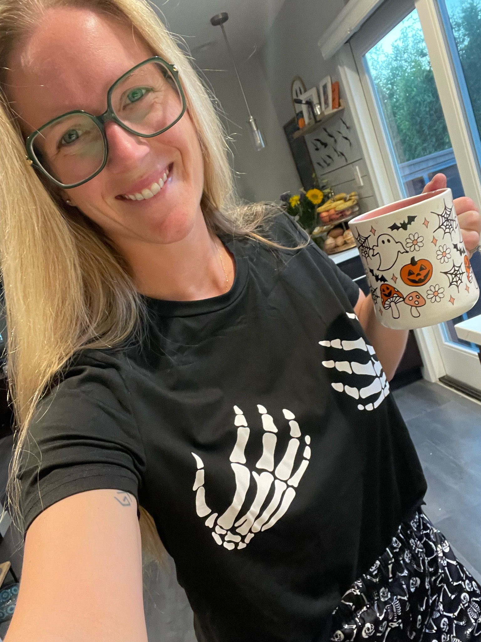 Halloween pajamas for the win! I love how soft the fabric is, the shirt fits nicely and I like that i can tuck it in. The shorts a little more high rise than I expected but overall I love these! Also the skeleton hands feel appropriate when breastfeeding 😂

#LTKFamily #LTKFallSale #LTKSeasonal
