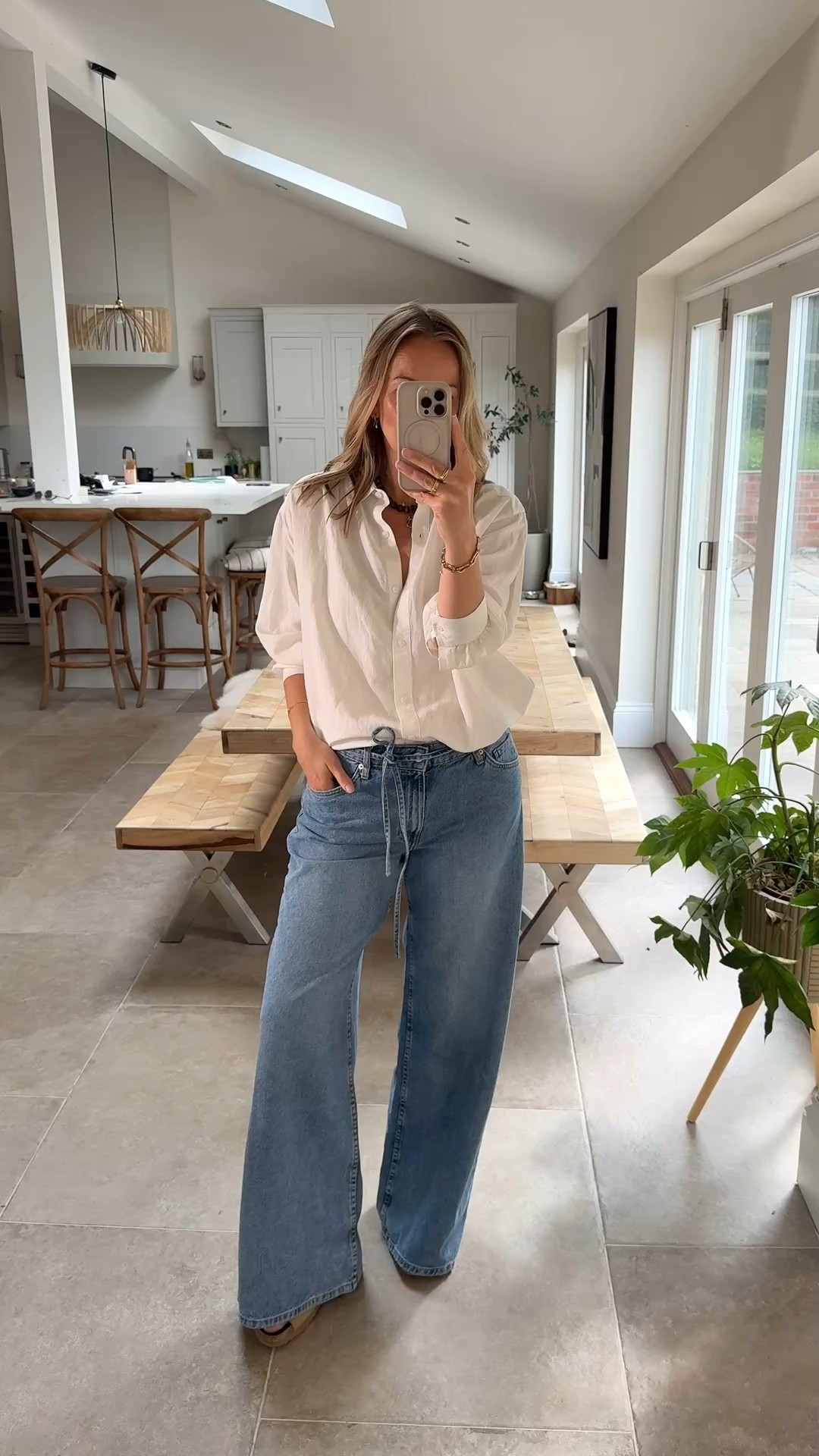 I don’t often say this but this shirt is one not to miss! 
I’m enjoying wearing it so much and it just feels so premium compared to a regular shirt … it has everything I look for …. Great drapey linen blend fabric , gorgeous cut (it sits long- you can see the length on my other posts) it has understated feminine touches that just make it feel great . 
I’m had so much lovely feedback on this style ! 
I’m wearing the large for a relaxed fit , to be honest the medium fitted me loose too but I prefer the option of more volume for myself. 
Do check out the other ways I’ve styled it . 

The jeans also deserve a mention… a lovely mid rise style , relaxed through the leg and slightly flared at the hem - chic and casual - wearing a U.K. 14 

Uniqlo
Mango 
Casual chic 
Everyday outfit 


#LTKmidsize #LTKstyletip #LTKsale