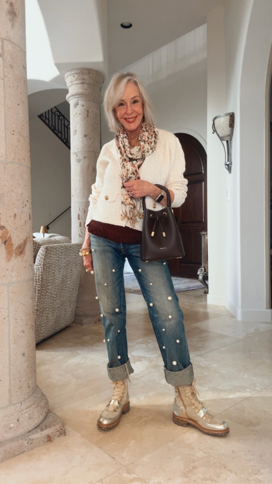 Paris/64 drawstring bucket bag. Pearl embellished jeans, of white cardigan sweater, gold metallic luxury combat boots with zipper


#LTKgrwm #LTKOver40 #LTKHoliday