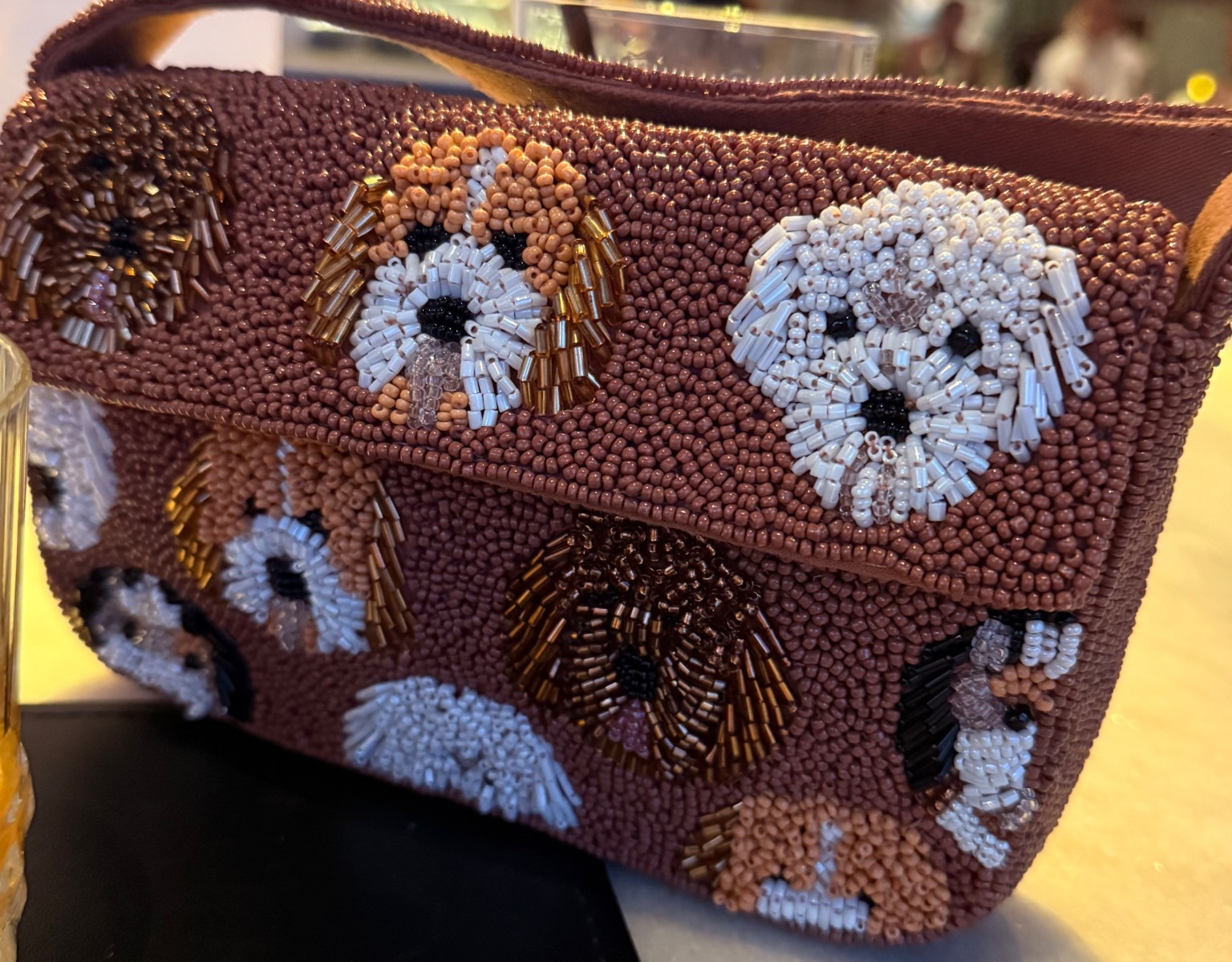 The cutest beaded bag ever! Dog print beaded bag from Anthropologie is the bag for fall! 

#LTKItBag #LTKSeasonal #LTKFindsUnder100