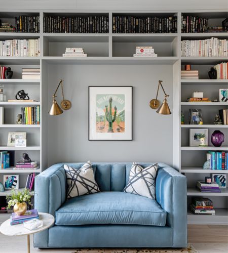 Let's take a moment for this bold reading room. ⚡️

DESIGN TIP 
◻️ Decide on the look you want for the shelves. I like to start with stacks of books. Place them on a few of the shelves and move them around until you see a symmetry or balance you like. 

◻️ Next layer in art and picture frames to start creating height.  Add objects like boxes or sculptural pieces in the open spaces. Then add unique objects on top of the book or use boxes as bookends for something out of the norm. 

◻️ Finish your shelves off by bringing in your favorite objects for a personal touch.

#LTKhome #LTKunder50 #LTKstyletip
