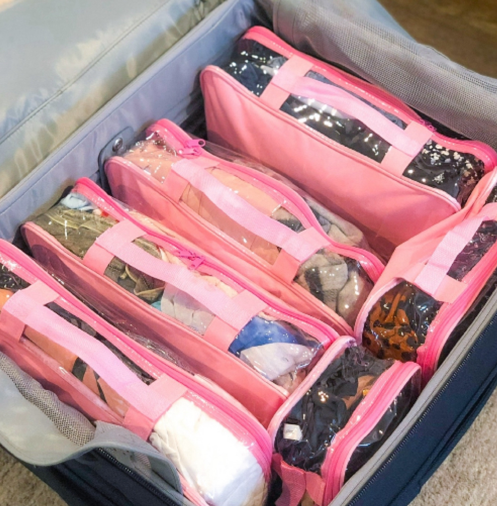 If you dont use packing cubes, you aren't traveling right. They keep all of your clothes organized in different ways (tops in one, bottoms in another, etc. or you can organize 
by complete outfits!) and once you get to your destination, just open them up, fold the top under and everything is still organized and perfect. If you have kids, you can get a different color for each child as well as a different color for each parent. These specific cubes are special. 

#LTKHome #LTKTravel #LTKFamily