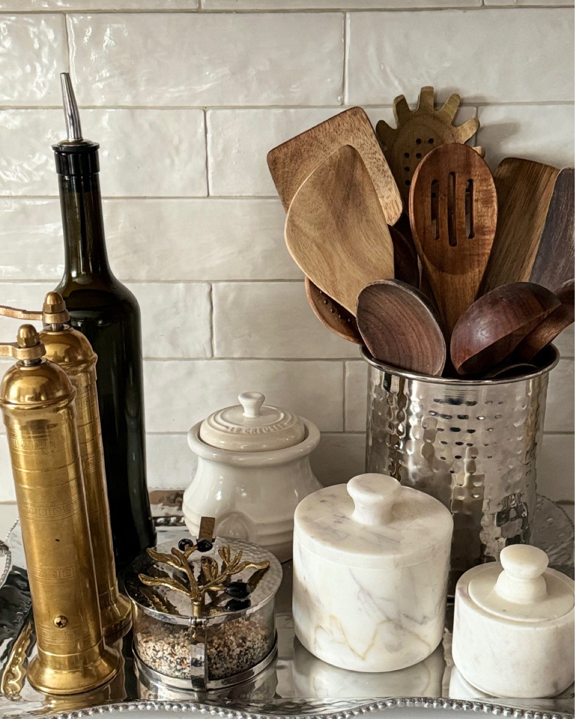 I’m in the mindset that nice things are to be enjoyed, especially when you spend a lot of time in the kitchen. I make sure to store my cooking items in a way that makes them look good but also functional. I recently replaced my old wooden kitchen tray, that holds all my frequently used tools/ingredients, for a beautiful one I found @homegoods. It makes me smile every time I cook— okay not every time, but it is pretty amazing!

#LTKHome