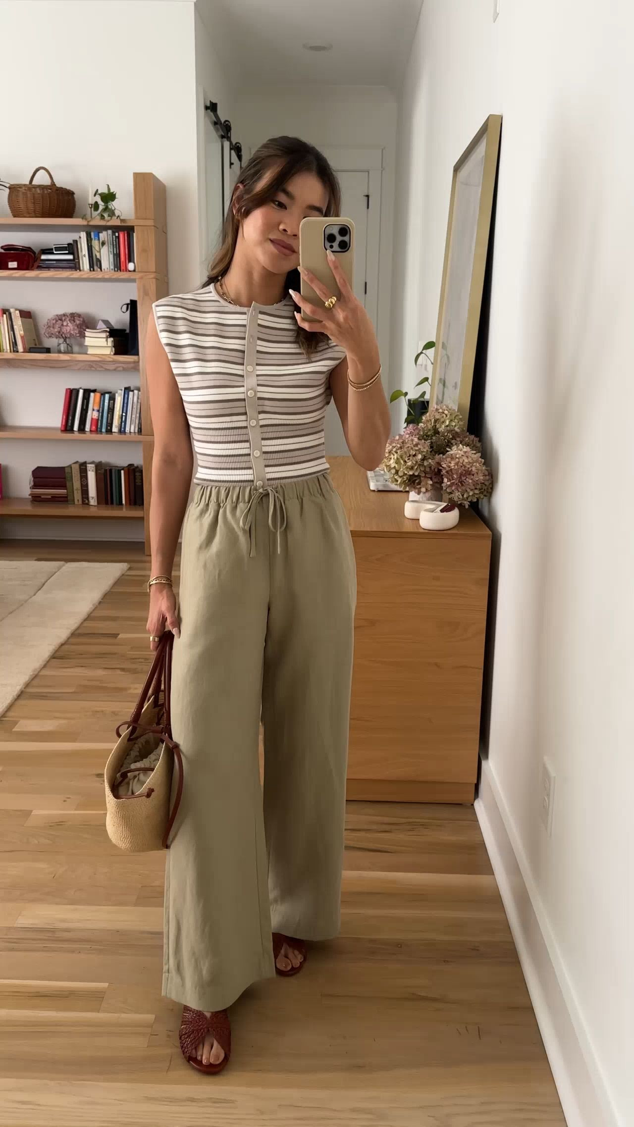 Summer outfit inspo. I love how lightweight these @Aritzia pants are!

Sizing info:
-Aritzia Golightly Sleeveless Cardigan (Size XS in Mtrpls Taup /Lt Brch) 
-Aritzia Lodge Pant Cruiselinen (Size 2XS Short in Martini Olive) 
-Sezane Low Paola Mules - Mohogany Smooth Braided 

Petite style, petite fashion, mom outfit, mom style, petite pants, petite outfit ideas, petite outfits, best pants for petite, petite pull on pants, spring style, spring outfits, beach outfits, vacation outfits, summer outfits, Summer style, summer trends, summer linen pants, aritzia pants, petite aritzia

#LTKootd #LTKSeasonal #LTKPetite