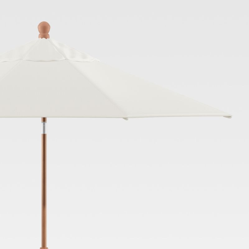 9' Round Sunbrella White Sand Outdoor Patio Umbrella with Tilt Faux Wood Frame | Crate & Barrel | Crate & Barrel