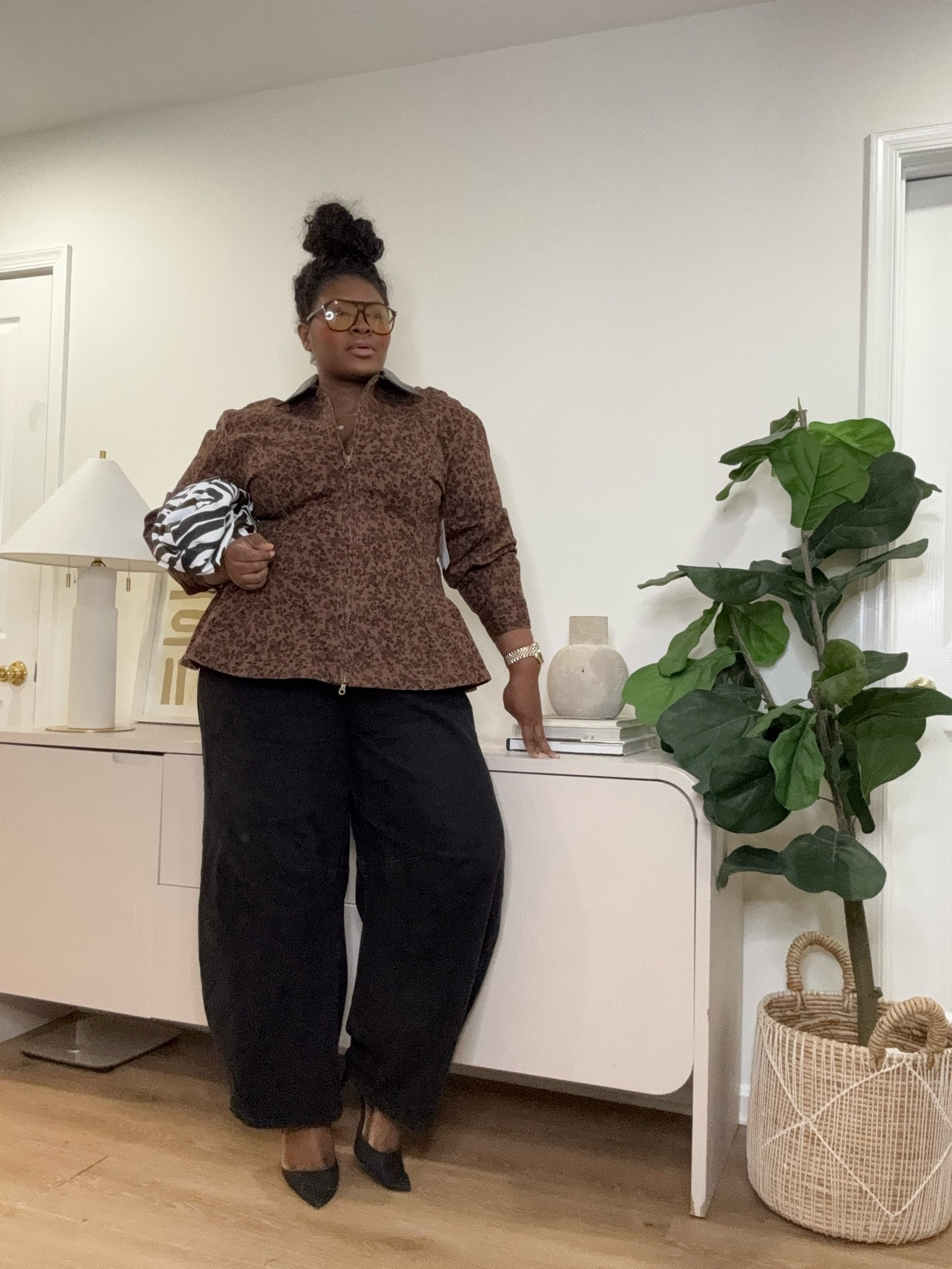 A good workwear outfit should move with your day. This printed top and black pants pairing feels professional for daytime but can easily transition into dinner plans with a change of accessories.   fall work fashion, office outfit inspiration, black trousers outfit, statement blouse, elevated casual style, wardrobe must haves

#LTKootd #LTKSeasonal #LTKWorkwear