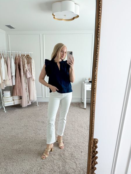 You all know I’m a sucker for eyelet detail and ruffles and this top from Walmart has both! I have it paired with my Nordstrom Mother jeans! Wearing size small in the top and size 28 in the jeans. Walmart finds // workwear // work outfits // work tops // white jeans // LTKfashion // Nordstrom finds 

#LTKSeasonal #LTKworkwear #LTKstyletip