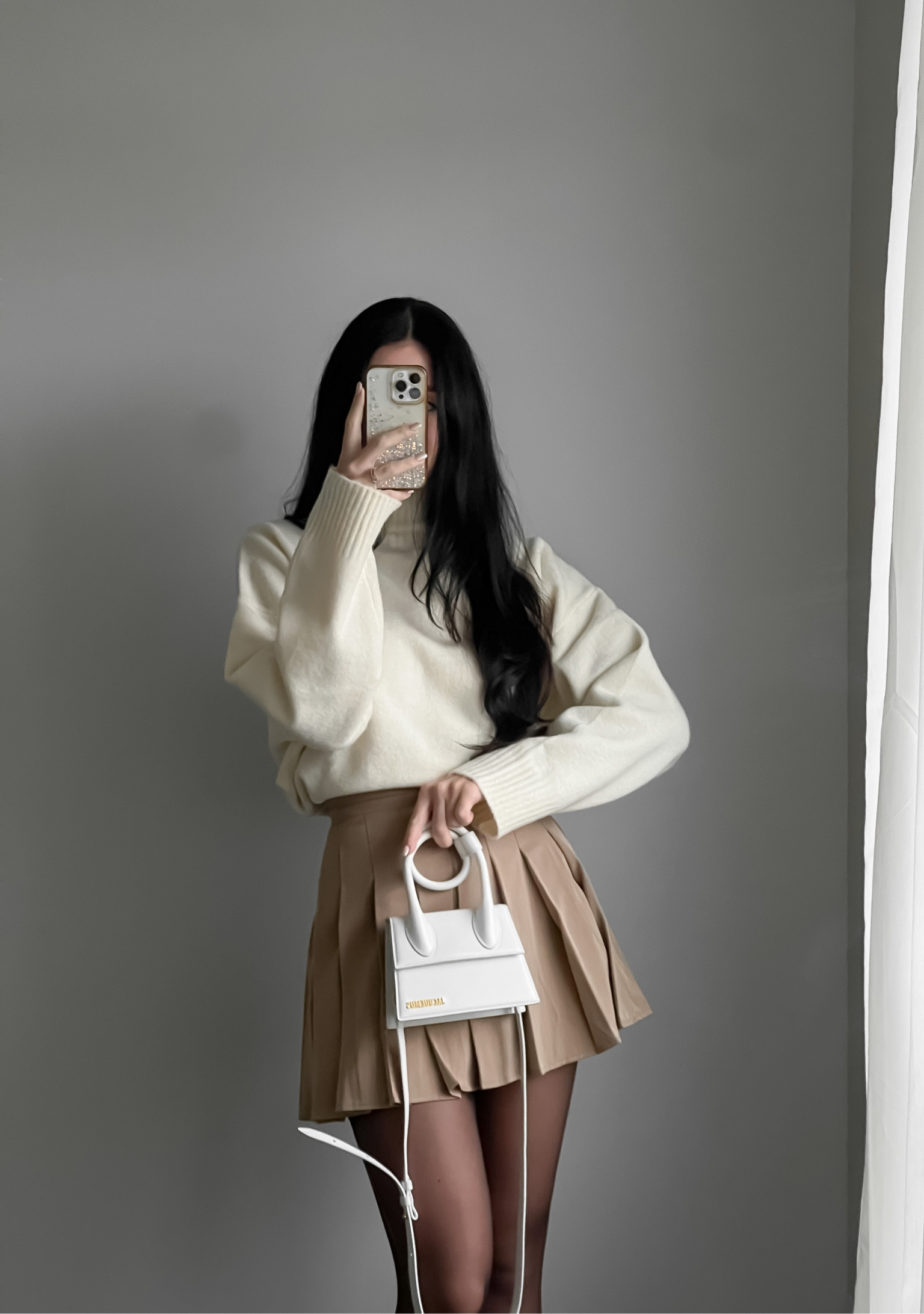 White sweater and beige pleated mini skirt are a great winter combo #christmasoutfit #holidayoutfit #winteroutfit #whitesweater #beigetennisskirt #miniskirt #jacquemuspurse

#LTKSeasonal #LTKstyletip #LTKHoliday