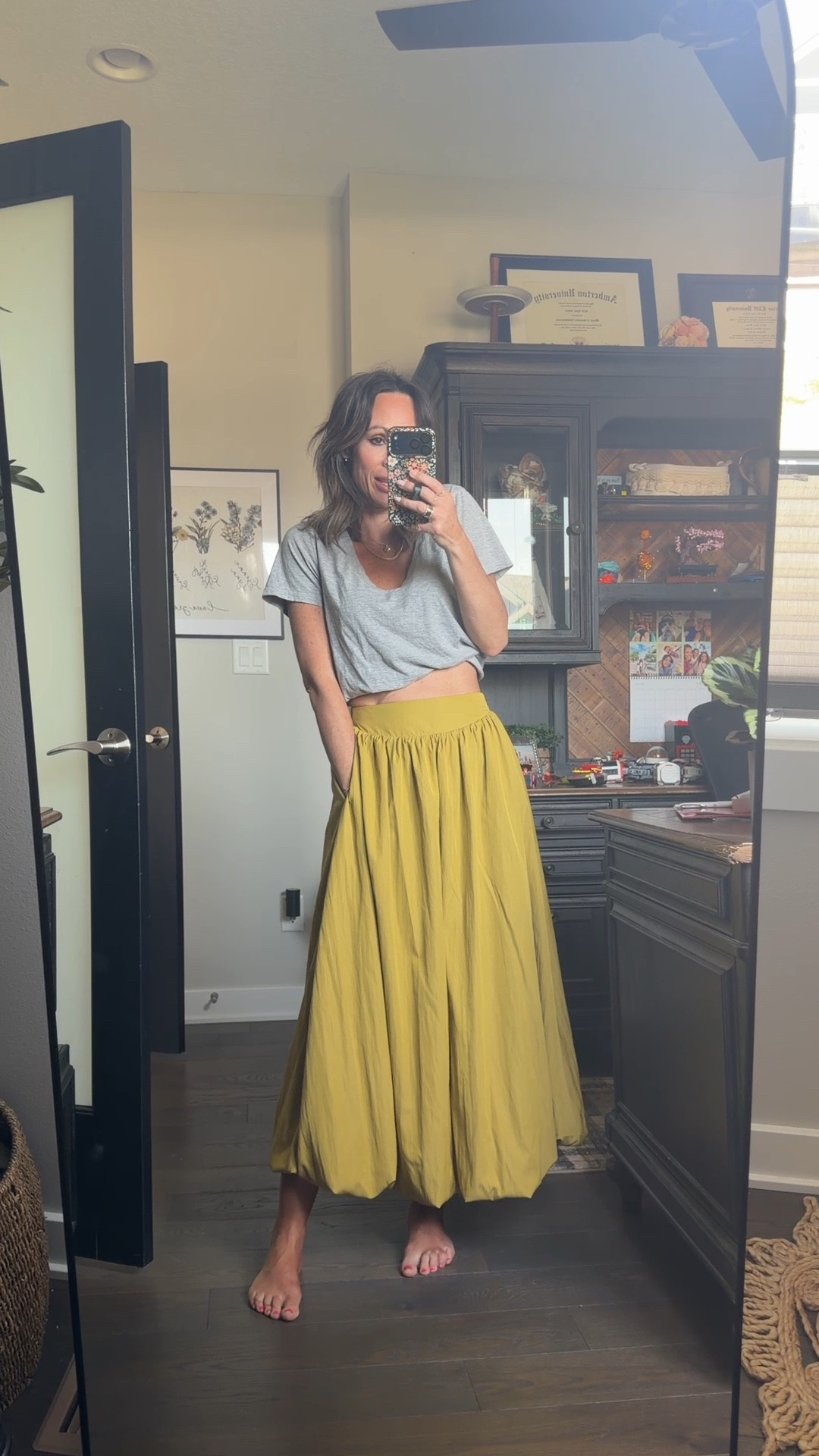 This skirt is amazing. It is like a bubble ham on the bottom so it’s like double lined. The color is amazing super stretchy waistband, but naturally sits above your hips in the most flattering spot. It kind of slightly these down but not an aggressive weird amount. The fabric is soft and this color I adore for this time of year. There are other colors available, but this is so good with a little tea like what I’m doing, or a tank. You could also wear heels and dress it up super easily. I plan to wear a little sandal and just run out the door. Super cute also with a baseball cap and sneakers! A little crop T-shirt looks so cute and all are from Amazon.

#LTKOver40 #LTKSeasonal #LTKmomlife