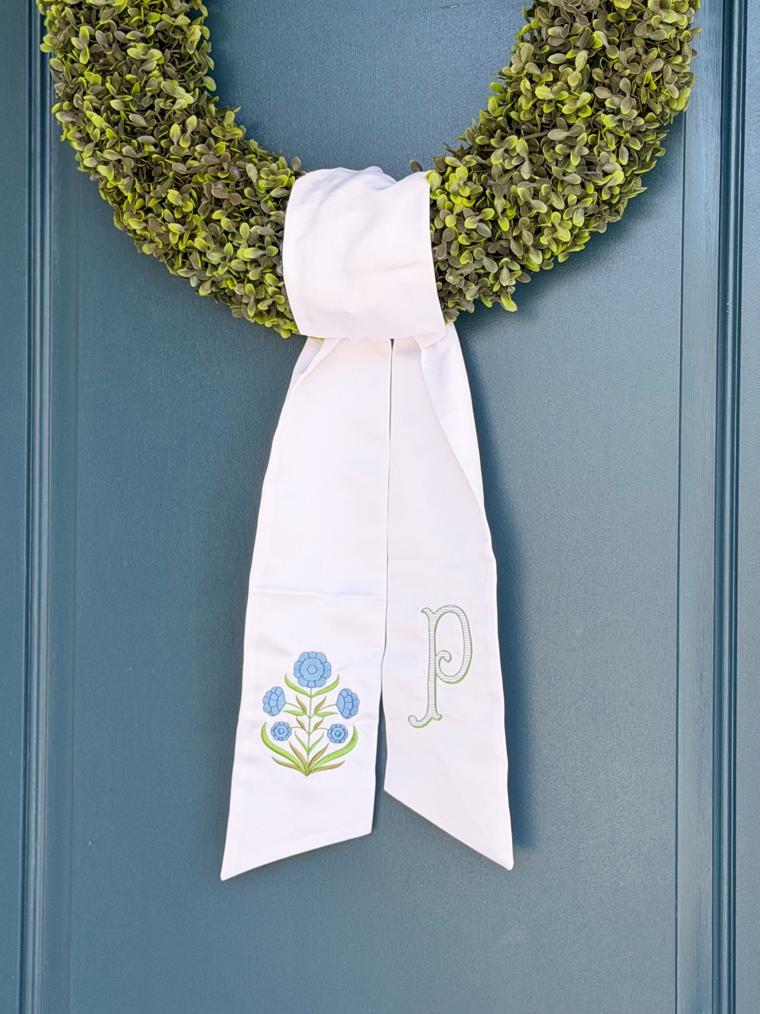 Love my new wreath sash from @etsy! It’s the perfect addition to my front porch 

Porch decor, front porch decor ideas, Grandmillennial style, Grandmillennial decor, boxwood wreath, classic style, preppy style, blue door 

#LTKHome