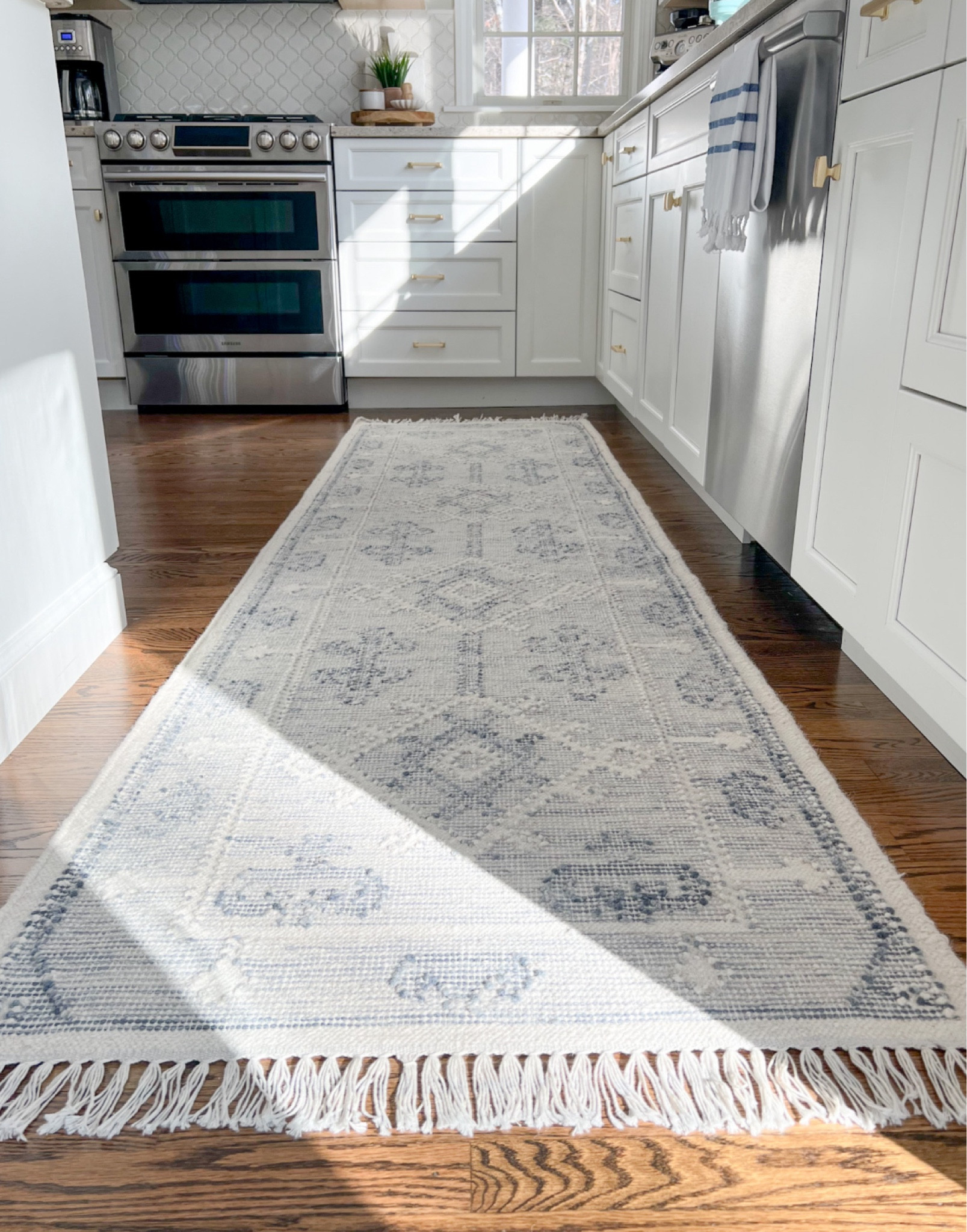My kitchen runner (which is available in all standard rug sizes) is 20% off right now! Other sizes are up to 30% off!
-
Kitchen runner, kitchen rug, runner rug, neutral rug, kitchen decor, neutral kitchen, coastal home, coastal decor, neutral home decor, beach style home, beach house style, coastal rugs, neutral rugs, blue rugs, gray rugs, rugs with fringe, serena & lily runner, coastal kitchen decor, white kitchens, 10-foot runner, alamere rug, alamere runner, patterned rug 

#LTKHome #LTKSaleAlert