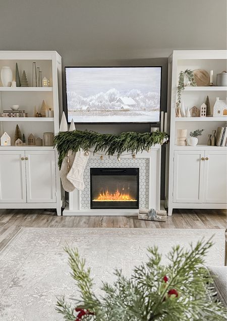 Neutral holiday living room decor ft. Collection Prints artwork 🌲 


Christmas decor, neutral Christmas decor, neutral holiday decor, winter decor, real touch garland, pine garland, Christmas village, mini houses, neutral stockings, winter artwork, White fireplace, hexagon tile, modern fireplace, electric fireplace, Ruggable neutral rug, Ruggable moral heriz, white bookshelves, built ins, white built ins, shelf decor, neutral artwork, studio mcgee, target home decor, holiday decor, candlesticks, gold decor 

#LTKHoliday #LTKhome #LTKSeasonal