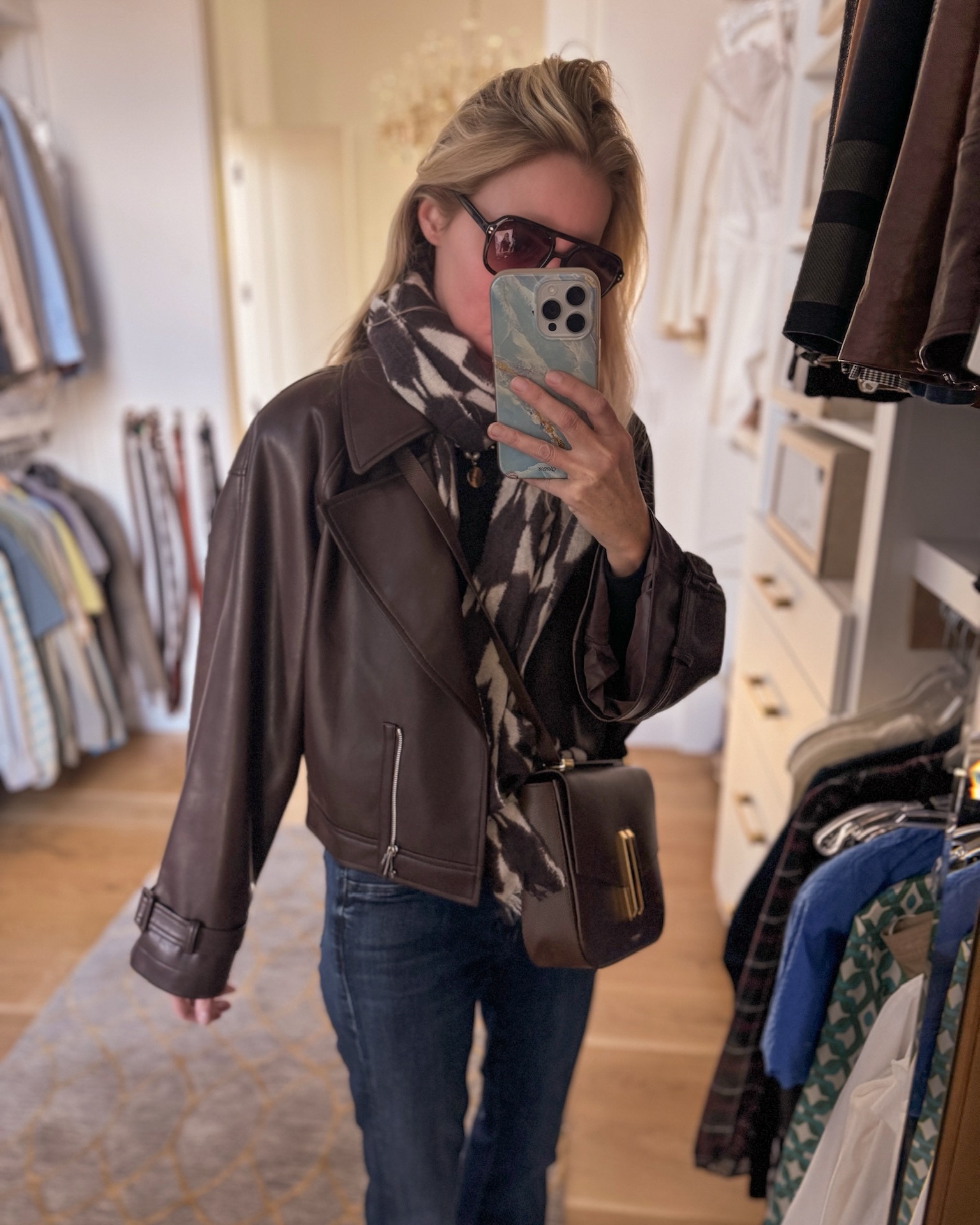 I just recently discovered Fabrique, a collective designer brand that work with more than 300 designers from different parts of the world. I purchased a few different items, and this leather jacket was a standout piece I wanted to share. It has a really cool oversized fit. I’m wearing an xs and you can see it’s still very roomy. I paired it with a chic Demellier crossbody bag and a pretty scarf and jeans for a casual everyday look. 

~Erin xo 

#LTKSeasonal #LTKStyleTip