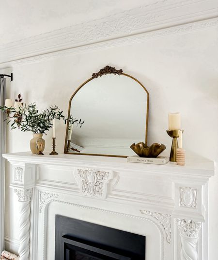 Home decor // mantle decor // antique mirror // mantle // fireplace decor // living room // 

#LTKhome #LTKfindsunder50