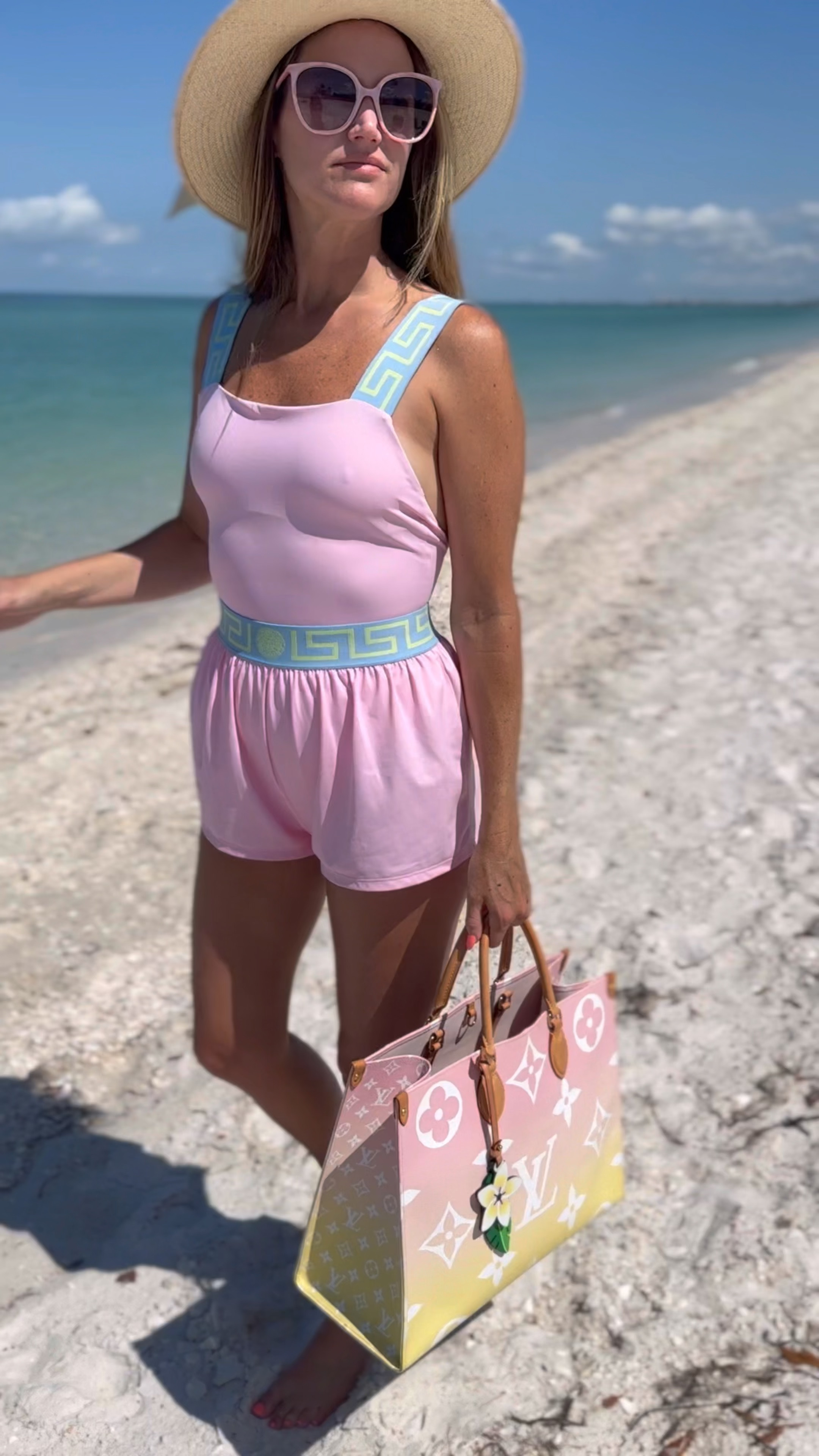 This swimsuit and cover up shorts are my obsession! I sized up in both! #versace #beachclothes #beach #vacationclothes 

#LTKSwim #LTKSeasonal #LTKTravel