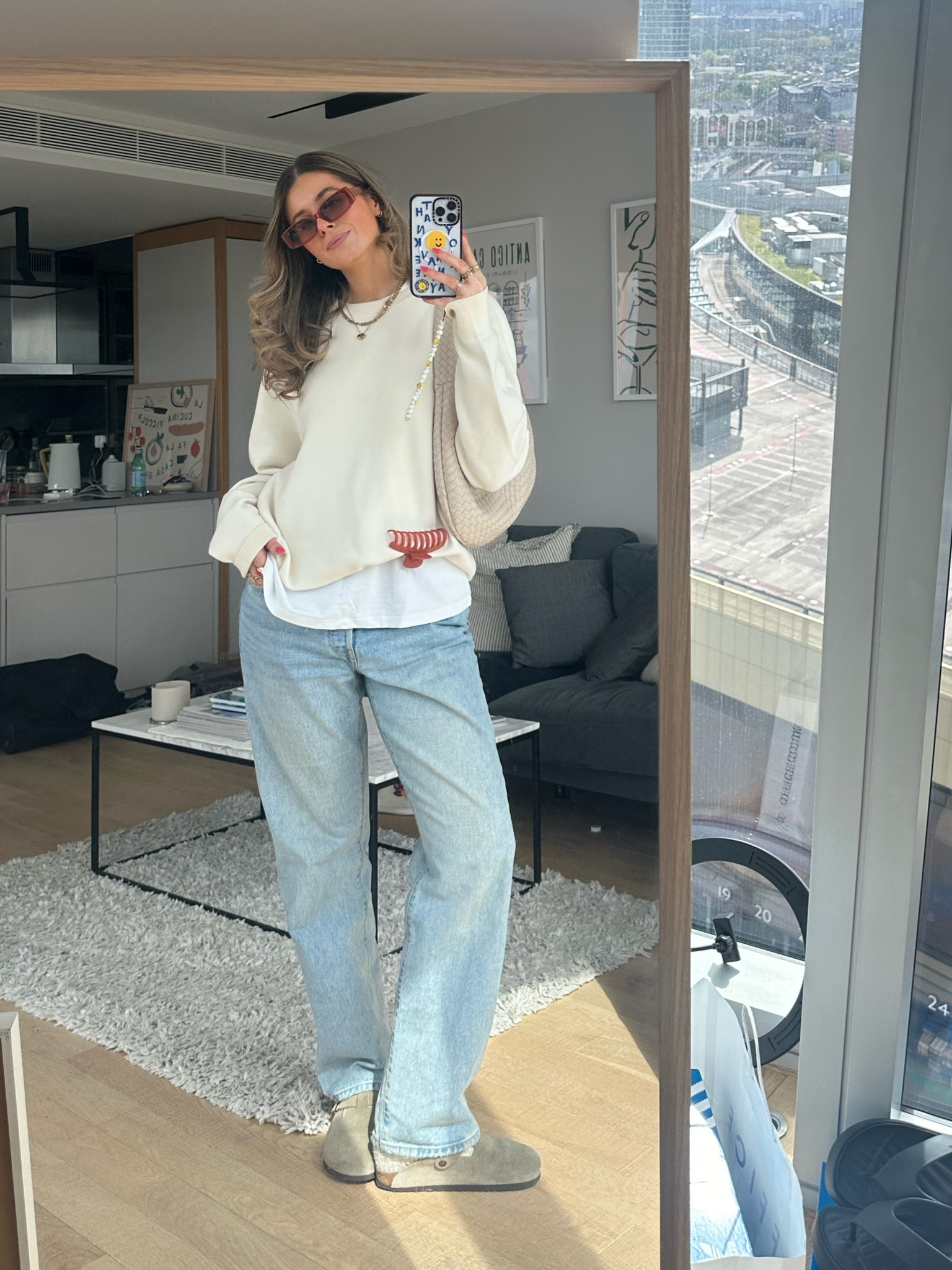 spring outfit, blue straight leg Levis 501 90´s white basic tee tshirt, cream knit sweater uniqlo, chunky knit sock, Birkenstock Boston, orange sunglasses, woven shoulder bag Anthropologie, gold jewellery

#LTKSeasonal #LTKshoecrush #LTKstyletip