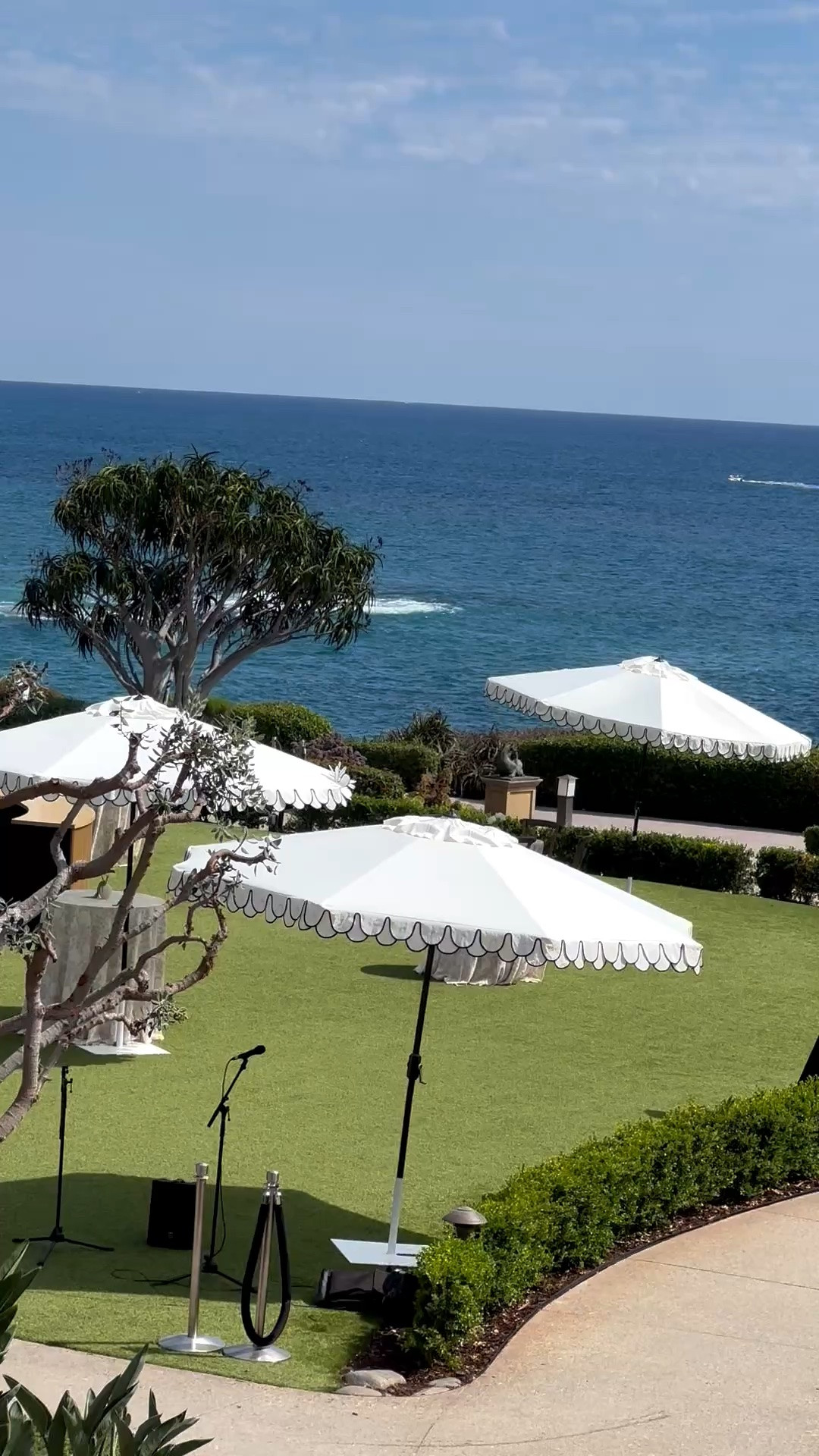 Pure resort energy. ☀️🌊

White scalloped umbrellas, lush green lawns, endless ocean views, and the most beautiful coastal sunshine—everything feels serene, elegant, and incredibly restorative. This is the kind of outdoor setting that instantly clears your mind and makes an ordinary afternoon feel like a true escape.

Bringing this resort-inspired feeling home with a beautiful outdoor umbrella, comfortable lounge seating, and soft coastal details is always the goal.

#LTKHome #LTKTravel #OutdoorLiving #ResortStyle #ResortInspired #OceanView #CoastalLiving #CoastalStyle #PatioInspiration #OutdoorUmbrella #LuxuryOutdoorLiving #SummerStyle #BeautifulDestinations

#LTKdayinmylife #LTKHome #LTKTravel