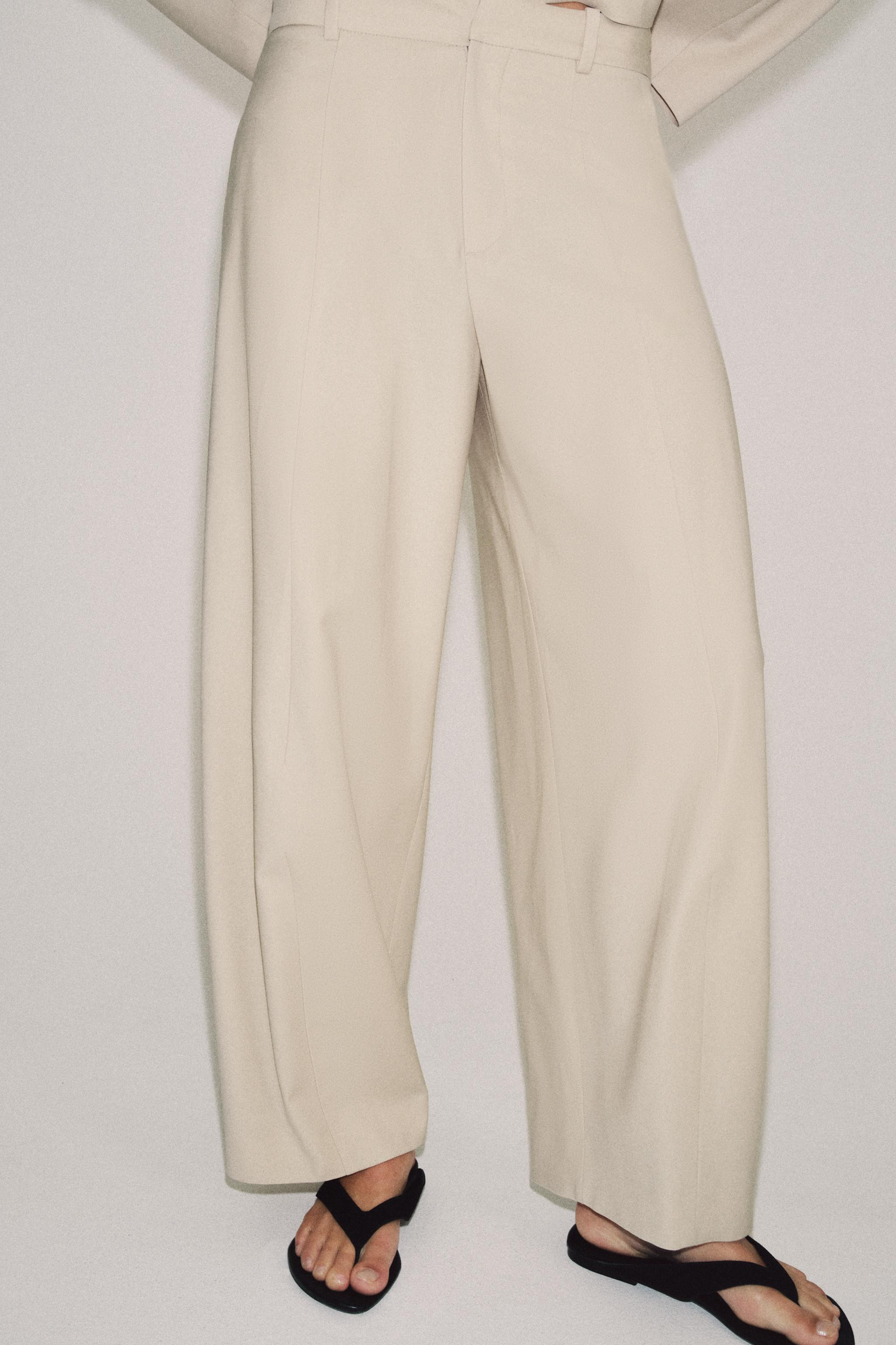ZARA WOMAN COLLECTIONPants made of wool blend yarn. Mid-rise waist with belt loops. Hidden side s... | Zara US