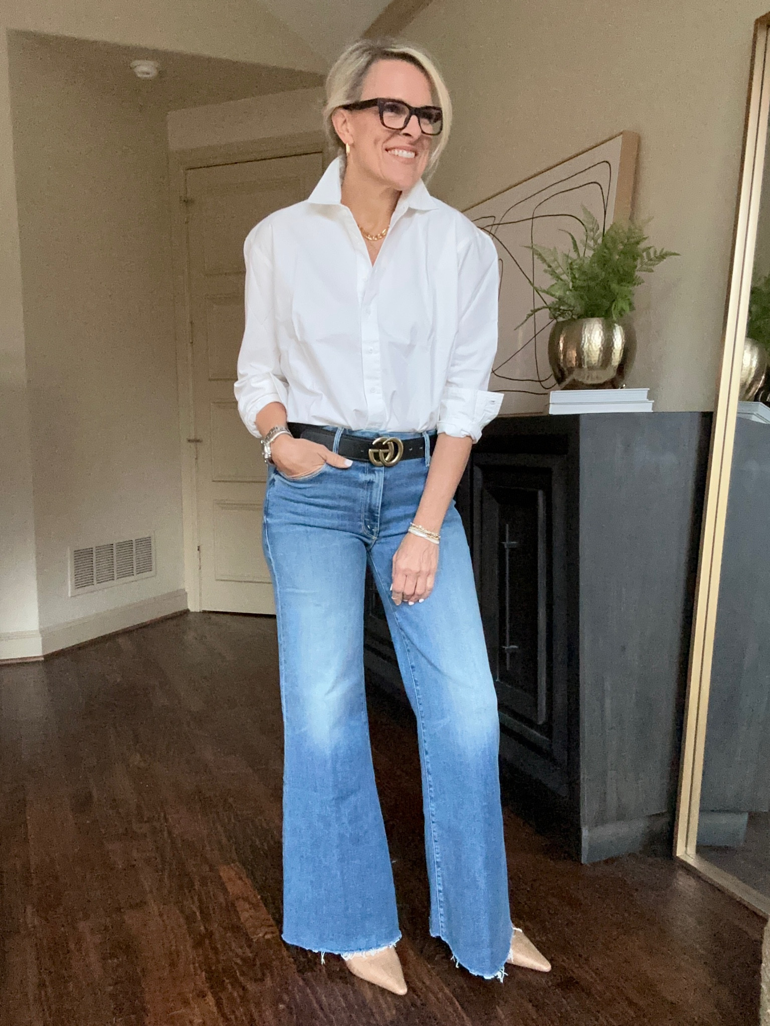 Wide leg denim and the best crisp white button up blouse 

Julia amory. Jcrew 

#LTKfamily #LTKstyletip #LTKover40