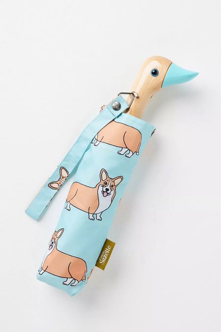 Brighten up any rainy day with these charming umbrellas featuring delightful corgi, dachshund, or French bulldog prints! Designed for both function and fashion, these umbrellas are crafted from sustainable rPET fabric, birch wood, and durable steel. 

**Key Features:**
- **Adorable Dog Prints:** Choose from corgi, dachshund, or French bulldog designs.
- **Sustainable Materials:** Made from rPET, birch wood, and steel for eco-friendly durability.
- **Waterproof Coating:** Keep dry with our reliable waterproof protection.
- **Wind Resistant:** Built to withstand gusty winds.
- **Automatic Open Button:** Effortlessly open your umbrella with a single button press.

Stay stylish and protected from the elements with these delightful dog print umbrellas. Whether you're a corgi lover, dachshund devotee, or French bulldog fan, we've got the perfect umbrella to showcase your canine passion!

Shop now and make rainy days a little brighter!

#LTKSeasonal #LTKFindsUnder50 #LTKHome