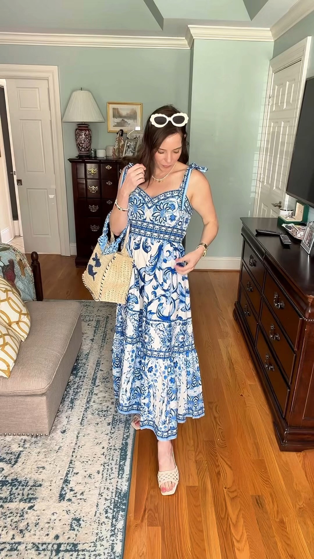 Blue & White Coastal Midi Dress Outfit 🐚💙


A classic blue and white midi dress moment that feels straight out of a coastal getaway 💙 This printed tie-shoulder dress is lightweight, feminine, and perfect for spring and summer days. I paired it with woven neutral slides, a straw beach tote with blue fish detailing, and gold statement earrings for an effortless preppy look. The tie straps and flowy tiered skirt make it so comfortable while still looking polished for brunch, vacation, or a seaside dinner.

Blue and white dress outfit, coastal style outfit, preppy summer dress, blue printed midi dress, beach vacation outfit, feminine spring style, straw beach bag outfit, classic preppy summer look. 🌊✨

#LTKPetite #LTKOver40 #LTKootd

#LTKdayinmylife #LTKOver40 #LTKSeasonal