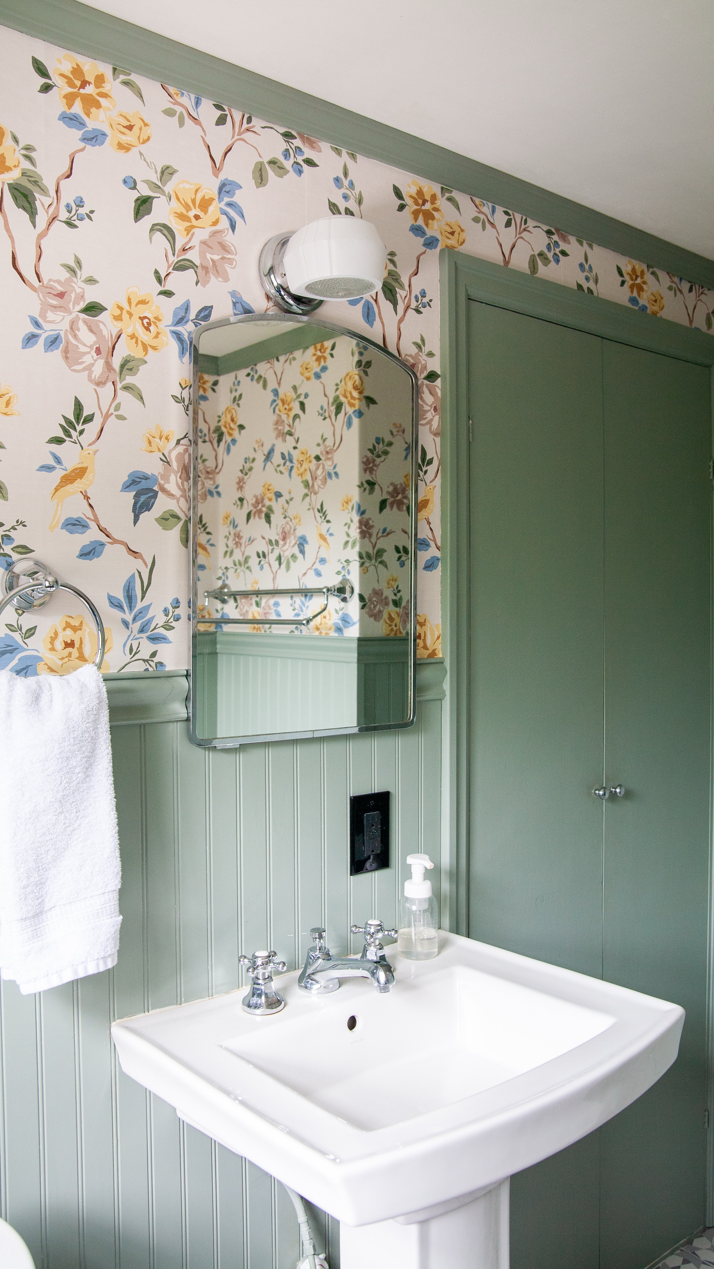 This big yellow rose wallpaper feels so cute and vintage in here, it makes me glad I kept the original light and mirror when I redid this bathroom years ago! And I love the vines climbing all over the walls when the view outside is so green this time of year. Wallpaper is @chasingpaper and I’m linking everything I can in LTK. Beach art is from @boulevard.bungalow.

#LTKHome