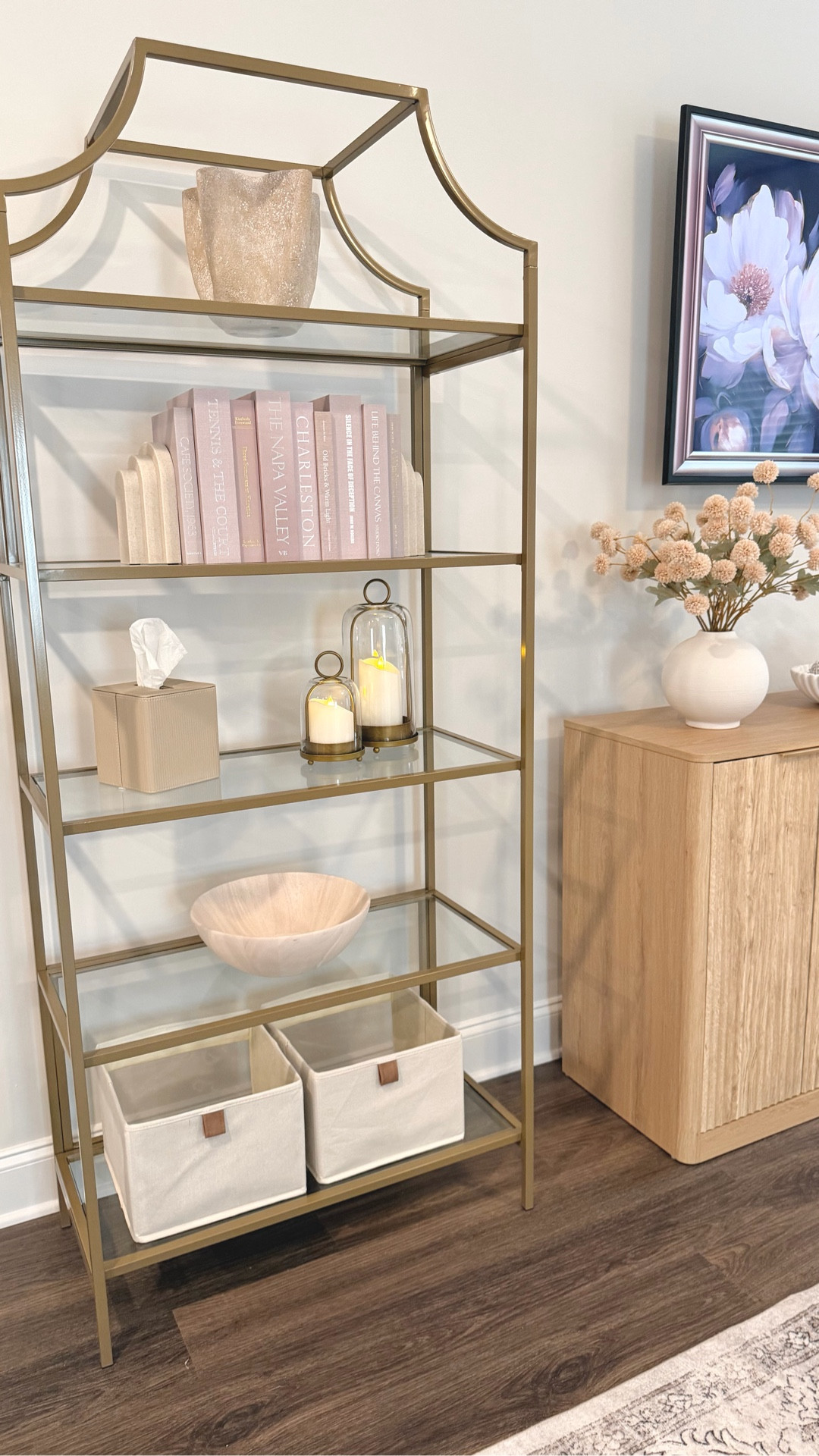 Styling shelves when you have a toddler is a little bit of a balancing act 🤎

I still want things to feel cozy and elevated… but they also need to make sense for real life.

So here’s what worked for this shelf:
• neutral books for styling (and a little hidden storage)
• faux candles so I get the cozy glow without worrying about flames
• baskets on the bottom for easy toy storage
• tissue box bc it’s chic + functional
• a few warm textured pieces to keep it from feeling too structured or boring

🤍because a home can be pretty and practical at the same time.

✨ SAVE this easy to follow styling formula for your next refresh 🤍

✨ Comment “LINKS” and I’ll send everything over (Make sure you’re following me to receive them)
✨ SHARE with a friend who’s in her cozy era
✨ FOLLOW for more affordable home finds & mom-friendly home styling

#shelfstyling #bookshelfdecor #neutralhome #cozyhome #affordabledecor homestylingideas neutraldecor cozylivingroom ltkhome

#LTKHome #LTKdayinmylife #LTKmomlife