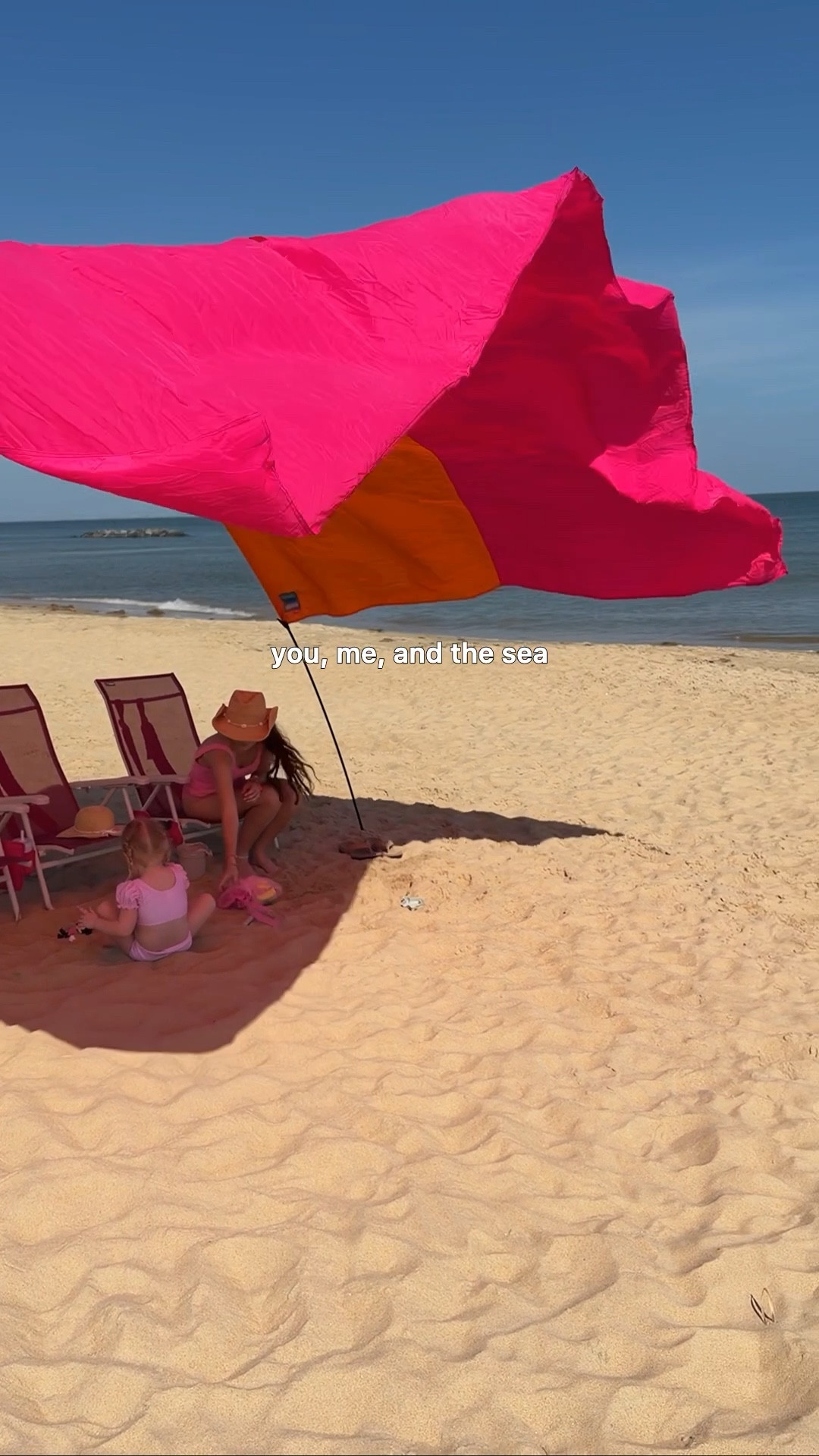 raising her by the beach > 
not sure what took us so long to get a @shibumishade but we’re obsessed!  🌊👙Setup is a breeeeze 😉and only took a couple of minutes. Provides tons of shade and this color combo!!! 🌅🩷🧡 The Shibumi chairs are also the best - comfy with 4 reclining positions, super lightweight, and matches our shade! Use my code JessicaSummer for 10% off orders $100+. Valid through 5/4!

#ad #shibumishade 

#LTKmomlife #LTKdayinmylife
