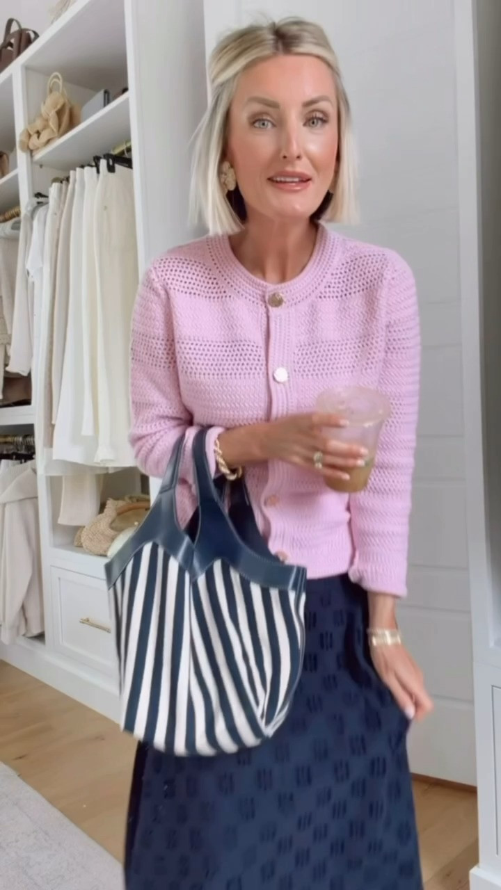 This look is perfect for a transitional look! The cardigan can be layered to provide some extra warmth for the cooler days. So perfect to wear to work as well! Wearing S in cardigan 0 in skirt.

Loverly grey, ann taylor, spring summer work outfit ideas, striped navy tote, how to style pink cardigan, navy eyelet midi skirt  

 #LTKootd #LTKSeasonal #LTKWorkwear