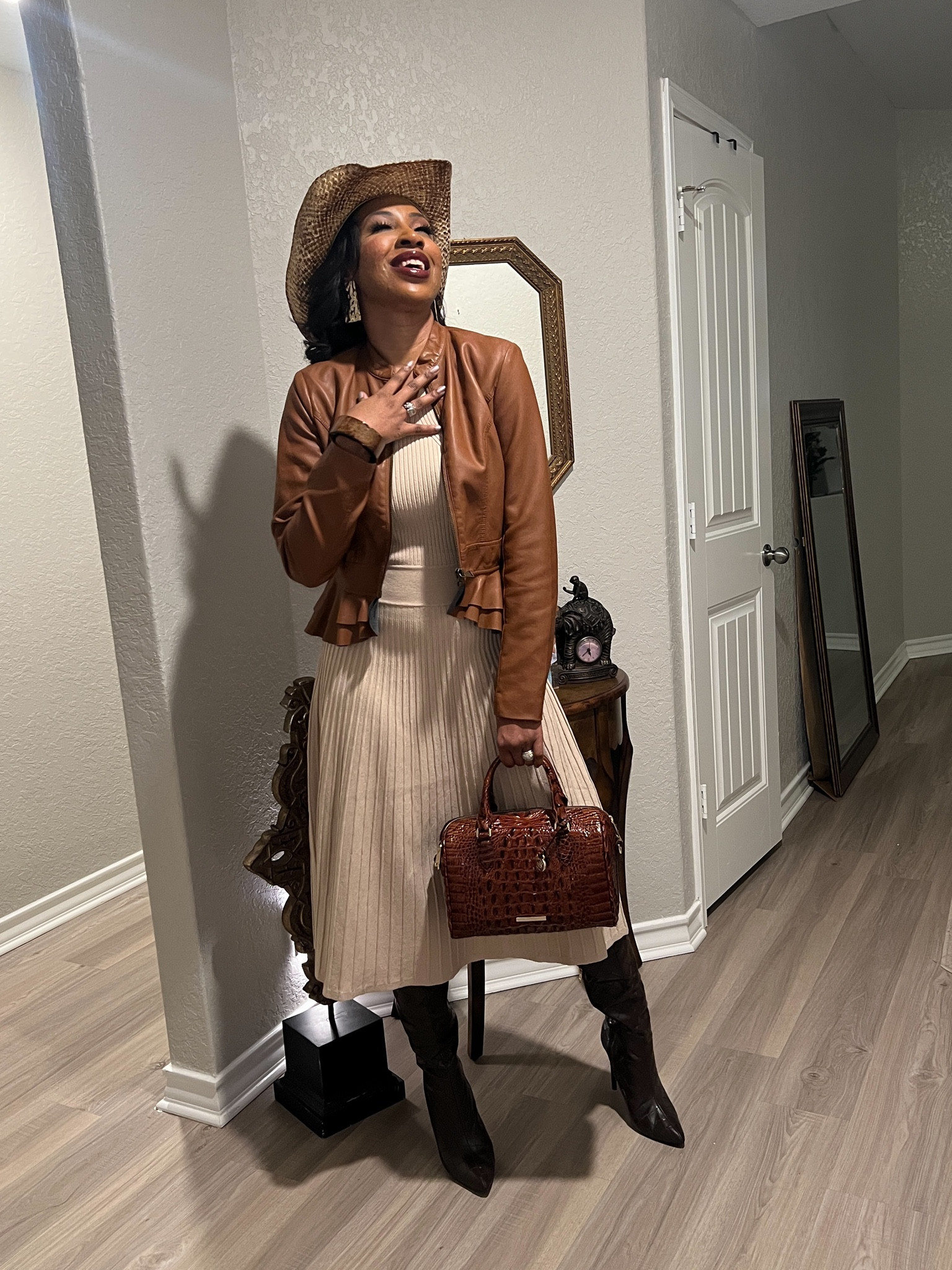 Channeling my inner cowgirl in this stunning sweater dress and cowgirl hat combo. Who says workplace fashion can't have a hint of western charm? 💋🐴 

#CowgirlChic #WorkplaceFashion #BeYou #cowgirlhat #fauxleather

#LTKover40 #LTKstyletip #LTKworkwear
