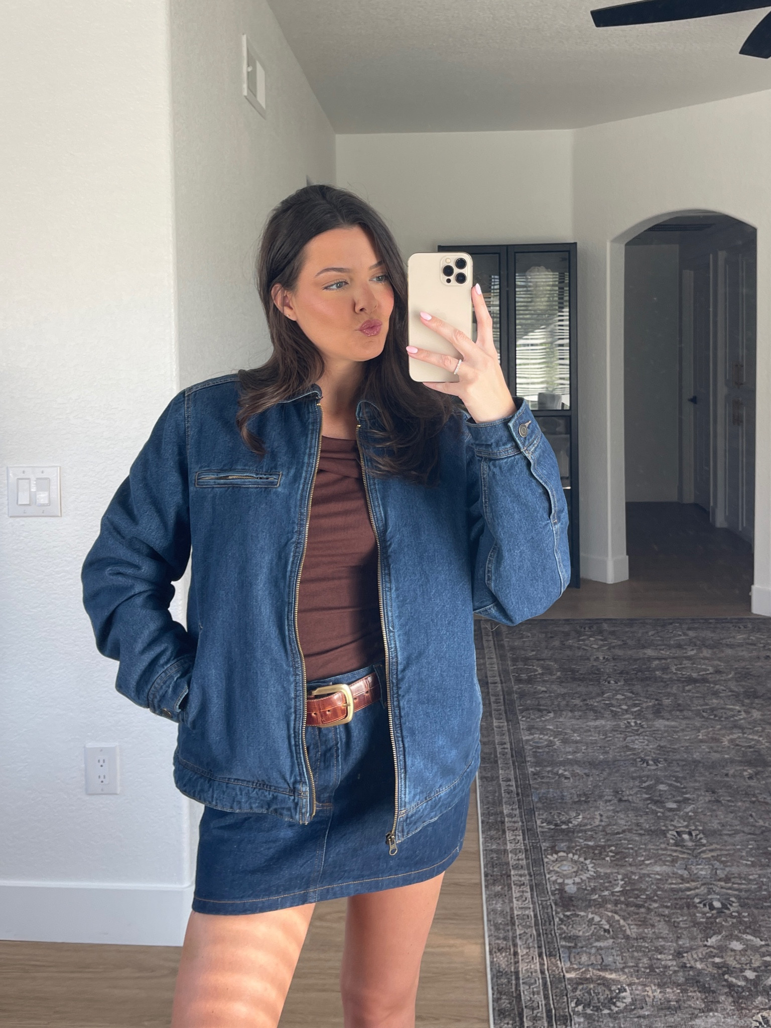 I love a denim on denim look! So easy to put together and a go-to outfit combo for me this season. 💓

I sized up one size in the skirt and wearing my true size small in the top & denim barn jacket! I’m 5’7” for reference! 

#LTKFindsUnder100 #LTKSeasonal #LTKHoliday