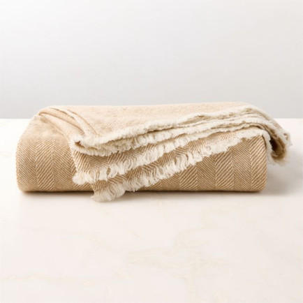 CB2 Ashwood natural herringbone wool throw blanket in cream and brown tones