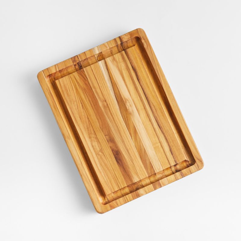 Teakhaus Edge-Grain Professional Cutting Board with Hand Grips 16"x12" + Reviews | Crate & Barrel | Crate & Barrel
