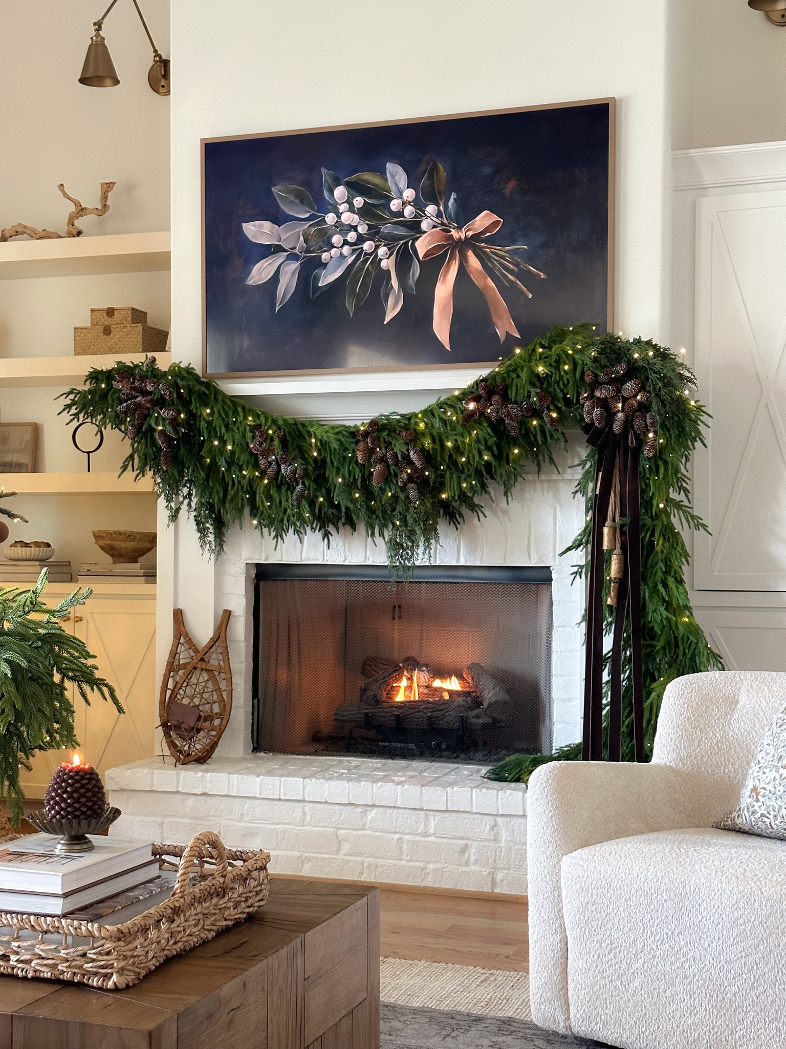 🎄Christmas Garland 🎄

#christmas #christmasdecor #christmasgarland #greenery #pinecones #pineconestems #woodsnowshoes #snowshoes #ribbon #velevetribbon #christmasribbon #fairylights #candles #chrostmascandles

#LTKSeasonal #LTKHome #LTKHoliday