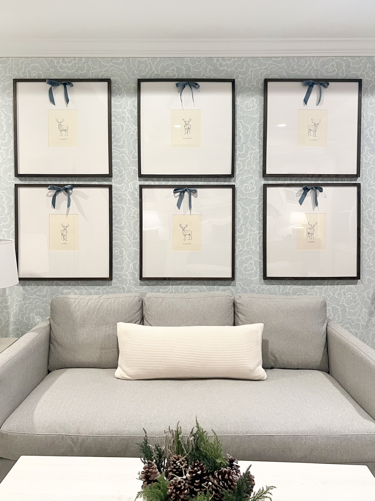 I found these adorable art prints that were a digital download from Etsy! I printed them at home using ivory cardstock to make them look a little nicer. I swapped out the photos that we had in these frames just for the holiday season. Btw, I’ve had these frames for years. They are a splurge but on sale right now and they make a big impact! Also linking all the other items in this spot. This coffee table is super inexpensive and not the best quality but works and looks great for this low traffic area. I would not recommend it for a high traffic spot. My sofa is from Target and the wallpaper is peel and stick! 

#LTKHome #LTKHoliday #LTKCyberWeek