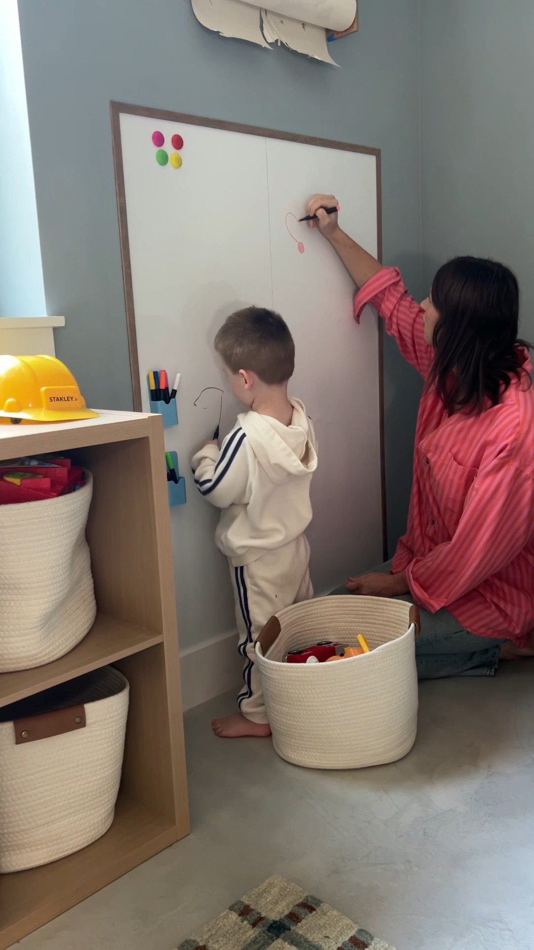 Little artist at work! This wall station has everything for big creativity — dry erase markers, magnets, and a roll of paper for endless masterpieces.

#LTKFindsUnder50 #LTKKids #LTKFamily